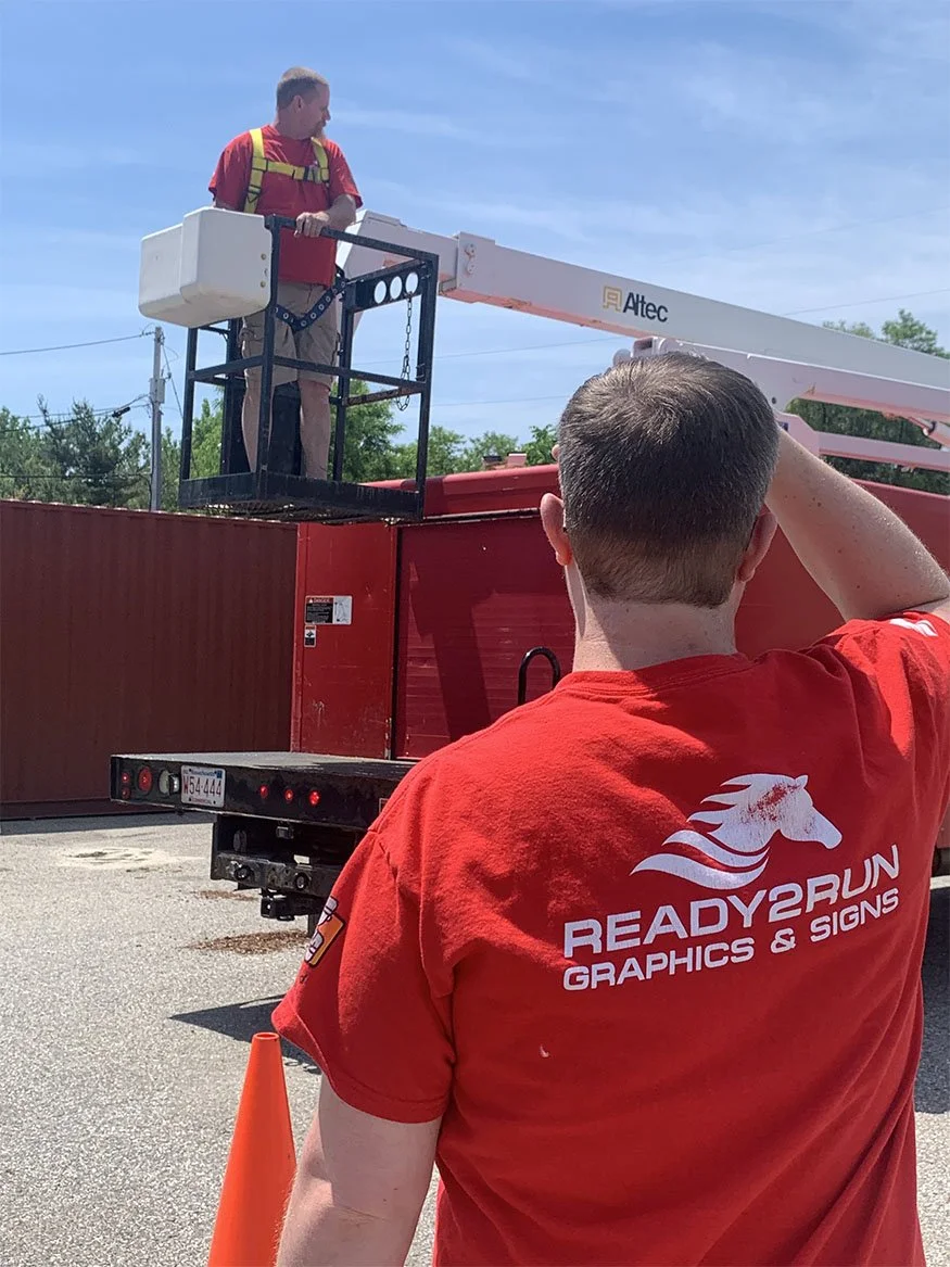 bucket truck used for signage installation
