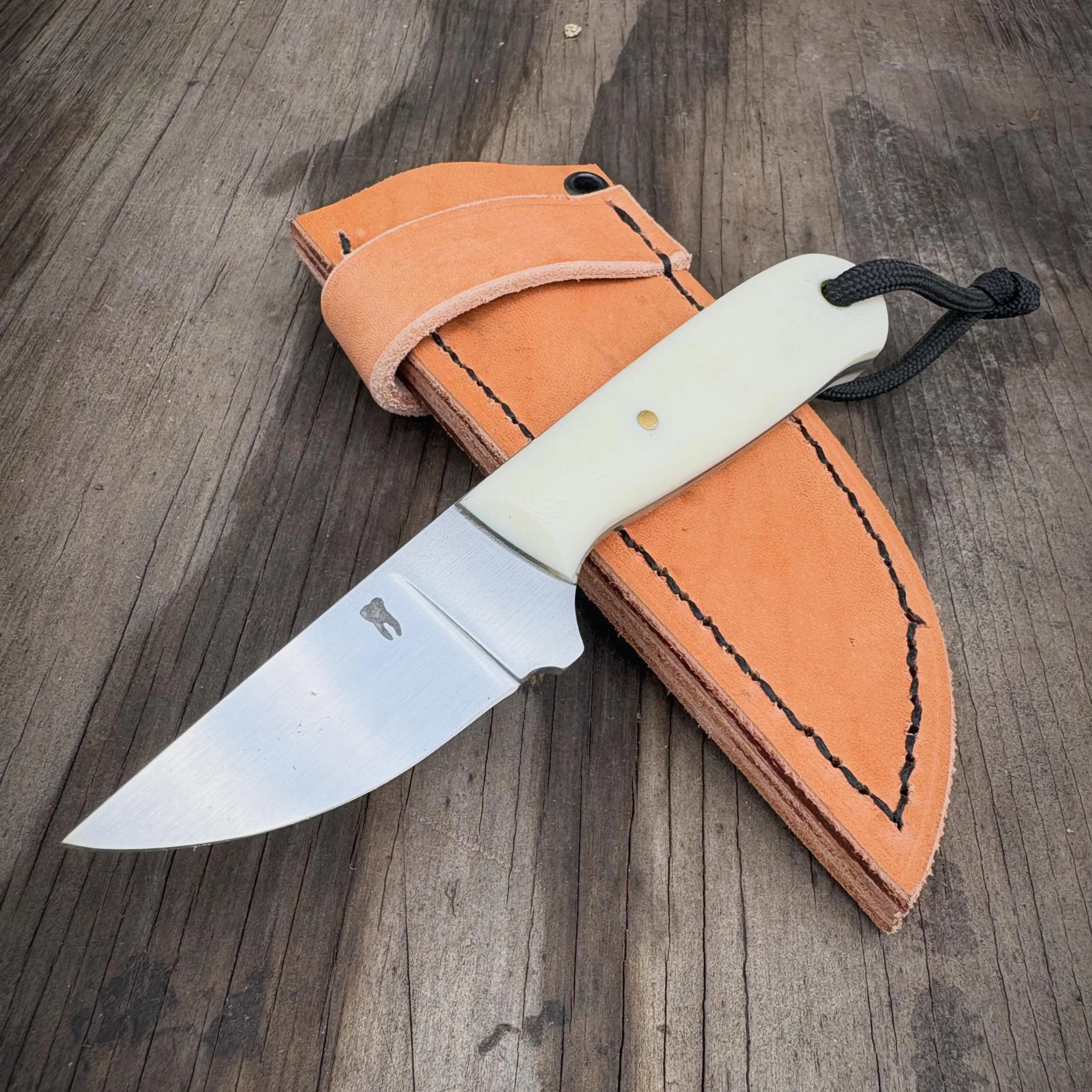 Chore Knife with leather.
Thank you @charlievoid23 !!!