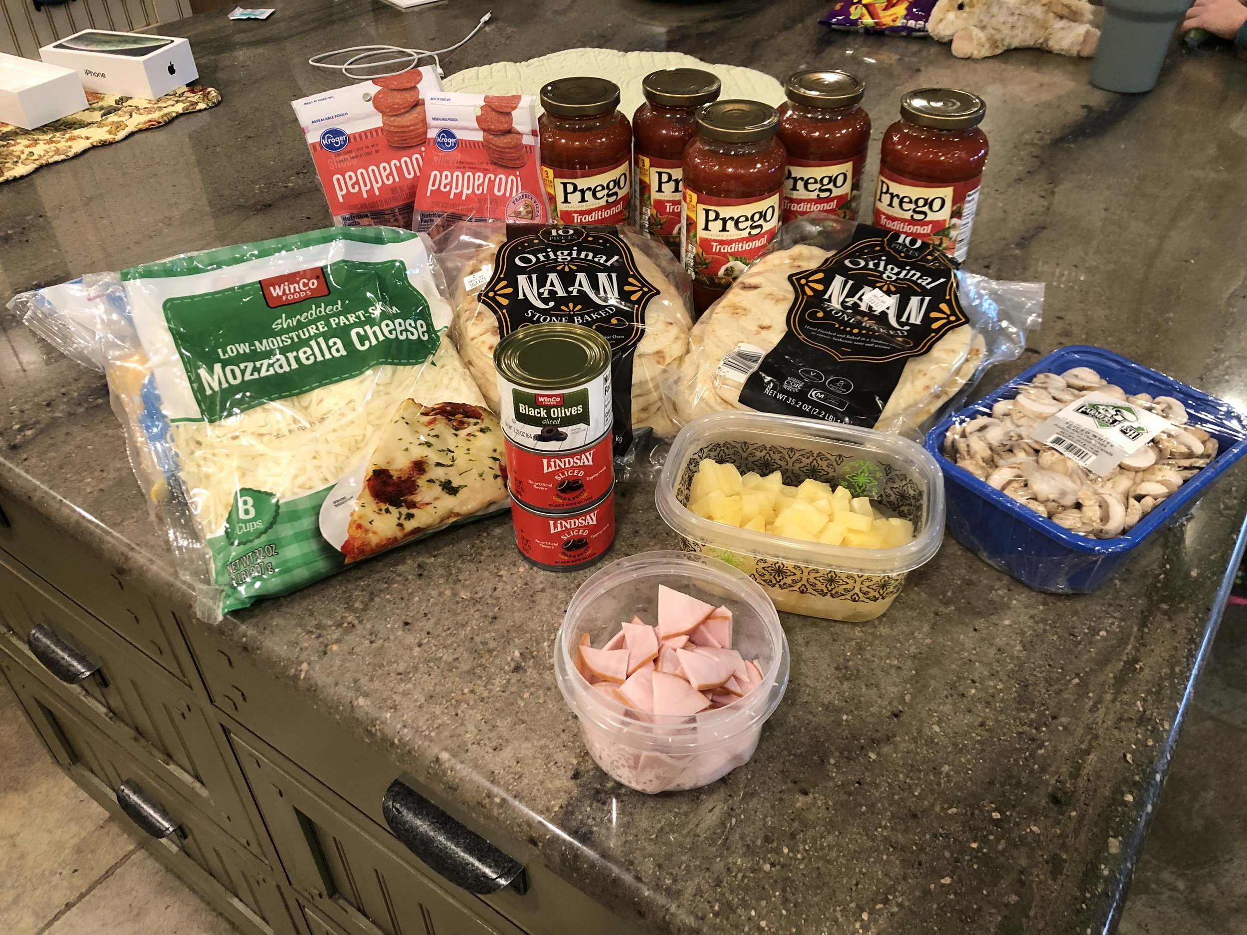 Family, Mini Pizzas, and Caramel Apples