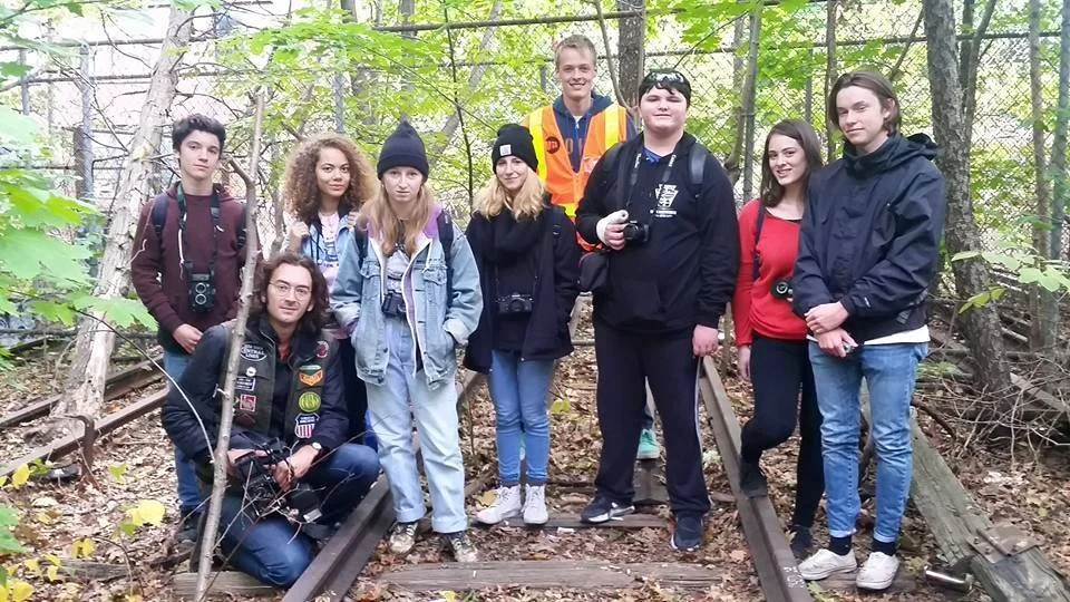 Instructors John Sanderson (second from left) and Janina McCormack (second from right) with students in the field