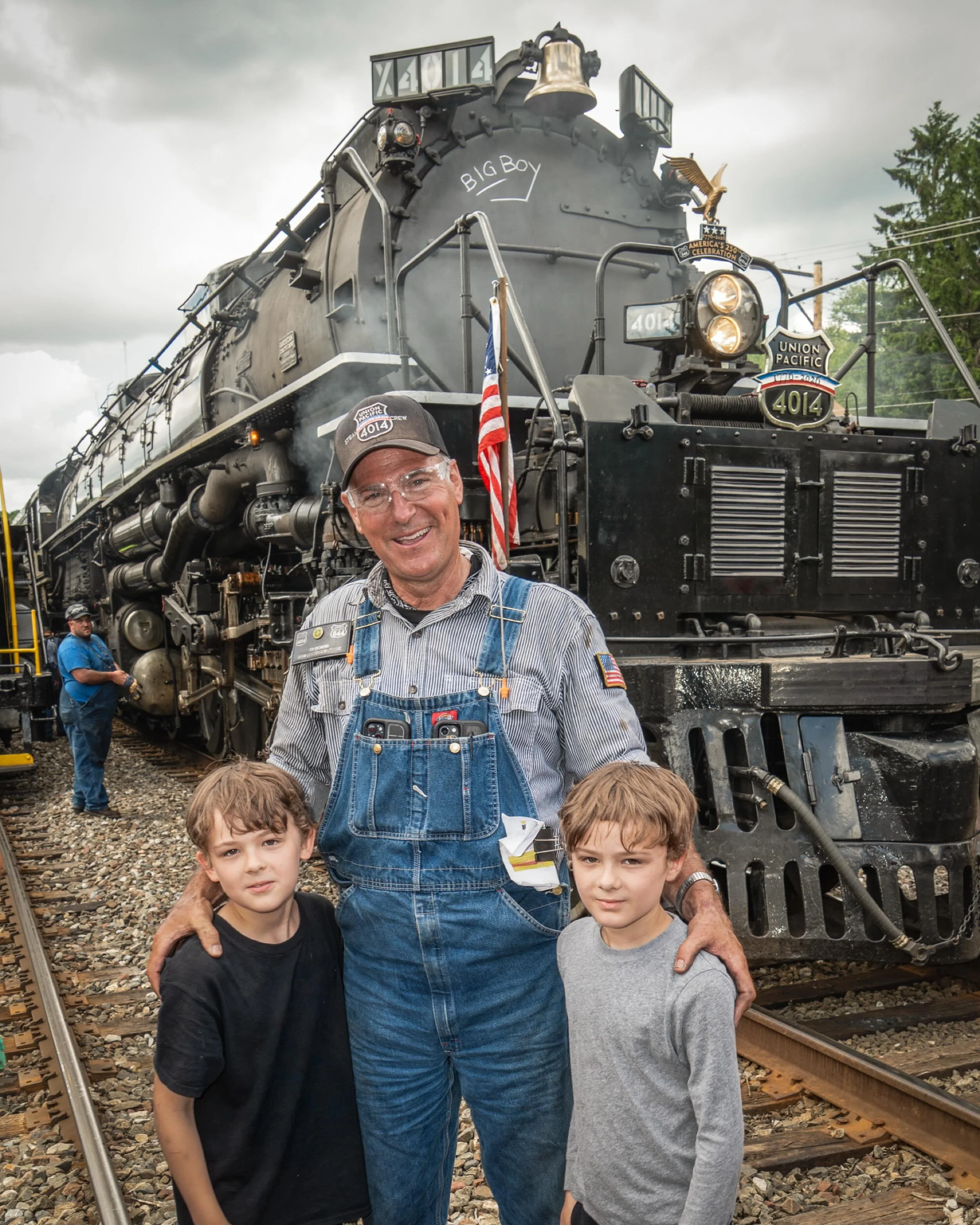 My boys John and William with the king Engineer Ed Dickens of the Union Pacific Railroad steam program which brought the Big Boy class 4-8-8-4 steam locomotive back to operation.  I told Ed how as a kid I&rsquo;d seen the Big Boy on display in Scrant