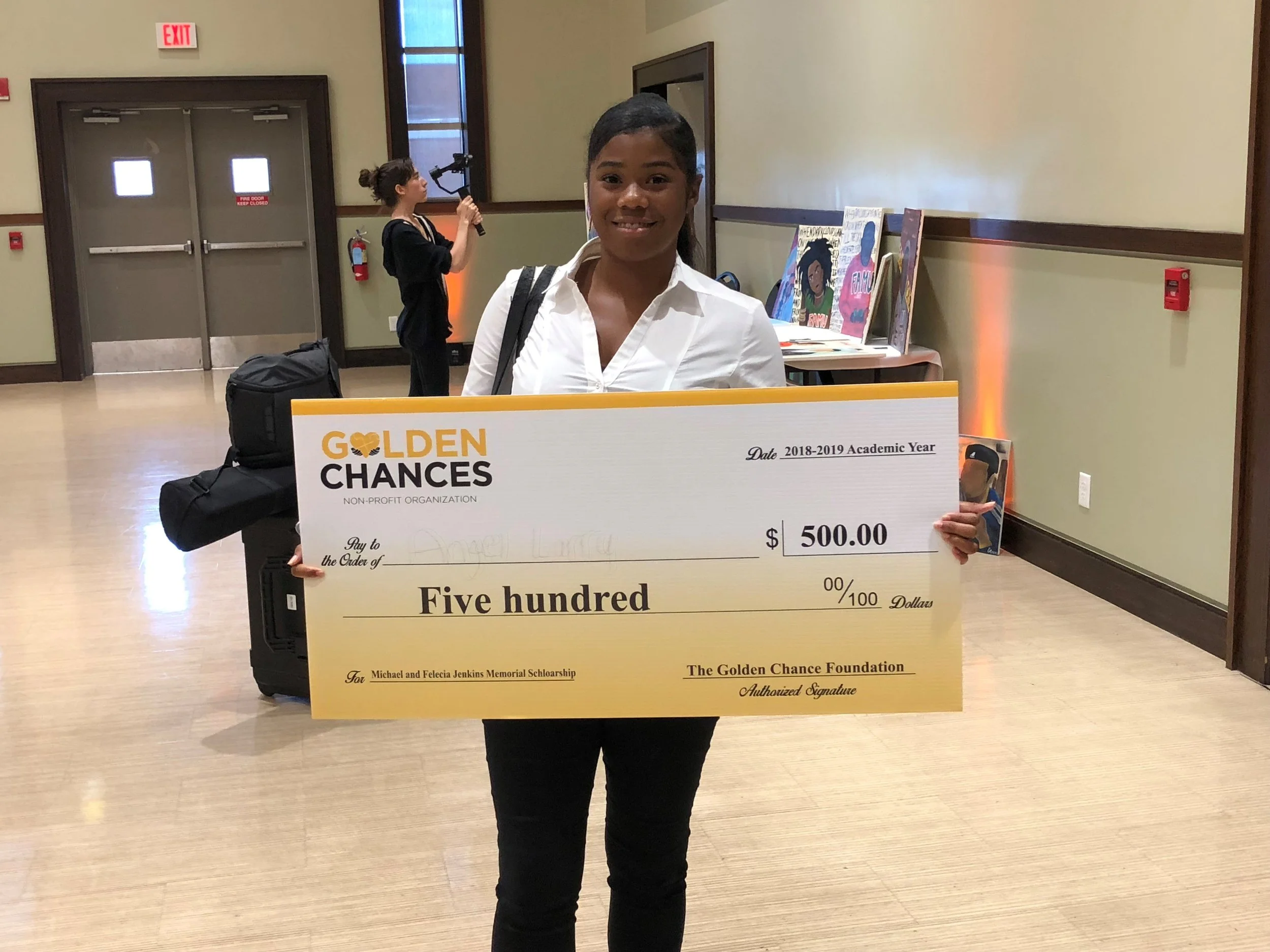 During the 12th Annual Young Alumni Giving Brunch which took place during Florida Agricultural and Mechanical University’s homecoming. The Golden Chance Foundation was able to present Freshman Student Angel Larry with one of our Michael &amp; Feleci…