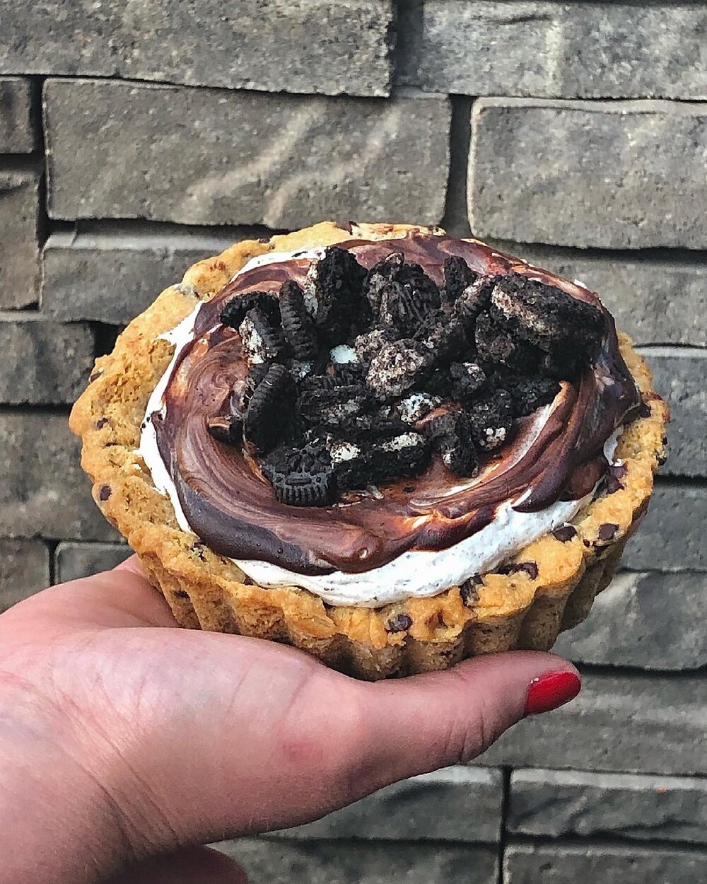 Can you say Cookie Monster Tart? This was the size of my head and it was so good! ⁣Chocolate chip cookie shell with cookies &amp; cream filled inside. 👌🏻
⁣⁣
⁣This new bakery find led to me some tasty treats. The s&rsquo;mores bar and trash blondie 