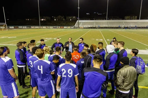 New Head Coach Christian Patiño motivates the squad before a match vs Vacaville Elite.