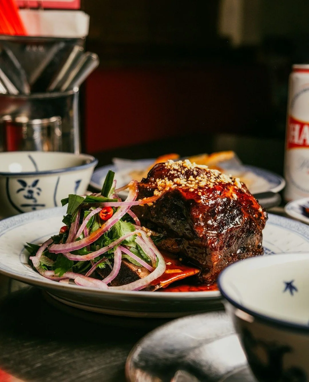 NEW🍂FOR🍂FALL 
Meet our 15-Hour Slow-cooked Short Rib.
Fall-off-the-bone, melt-in-your-mouth tenderness, kissed by the grill for a smoky charred finish, and glazed with sweet-tangy tamarind. Served with bright herb salad, pickled lotus stems, an