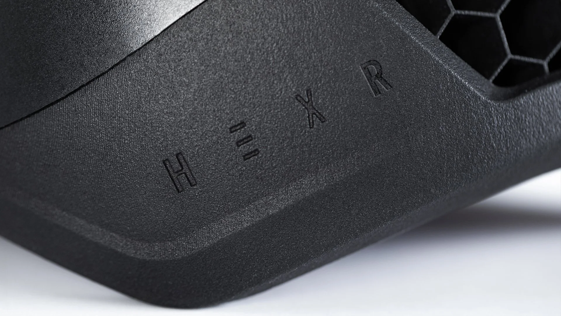 Hexr - helmet - photography - 3D print - design - hex - detail - chamfer - edge - printed - custom - black - material - logo - embossed