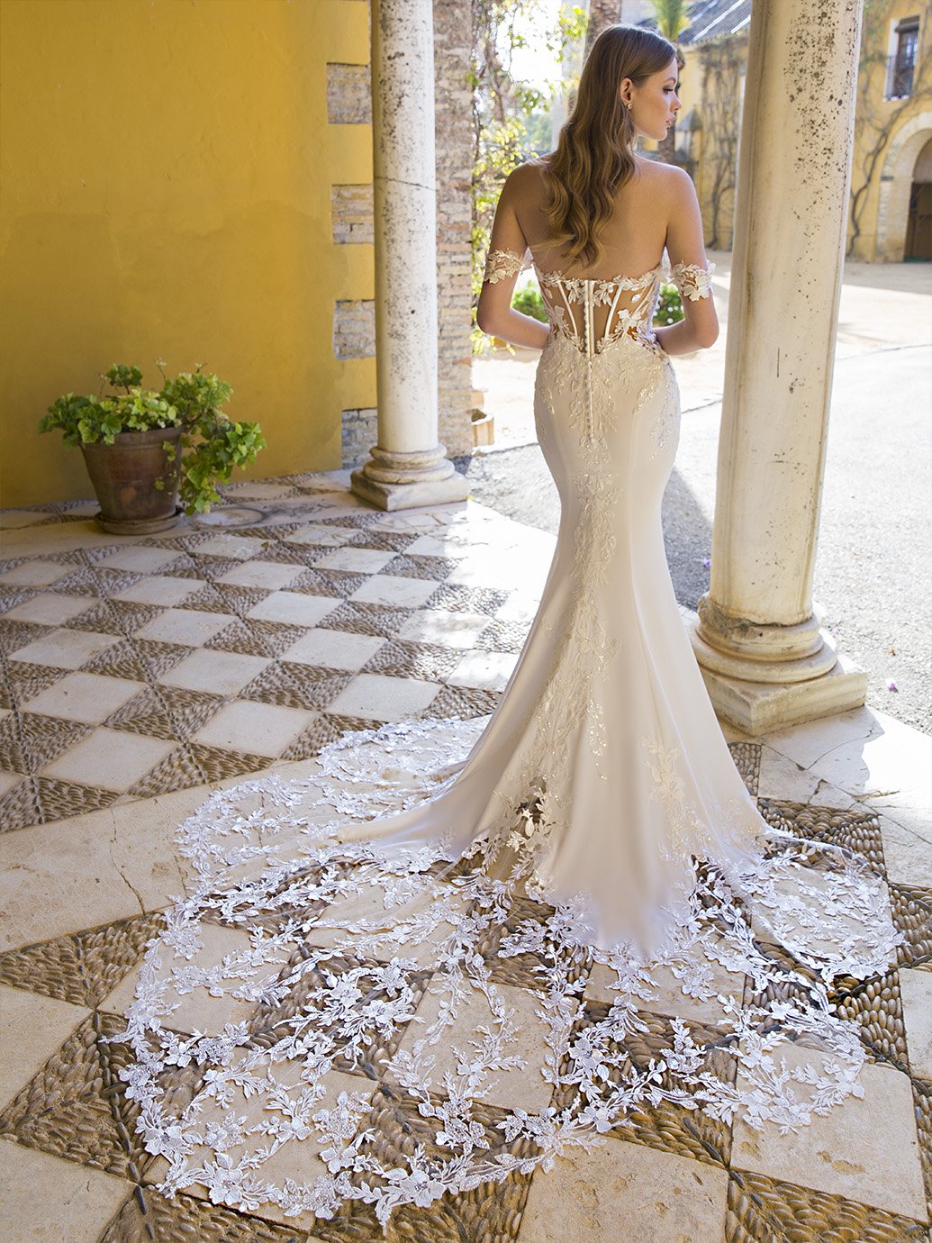 Preston from Blue by Enzoani: An elegant crepe and lace mermaid wedding dress with plunge sweetheart neckline and optional cold shoulder straps | Available at & Wolf Bridal in Wiltshire