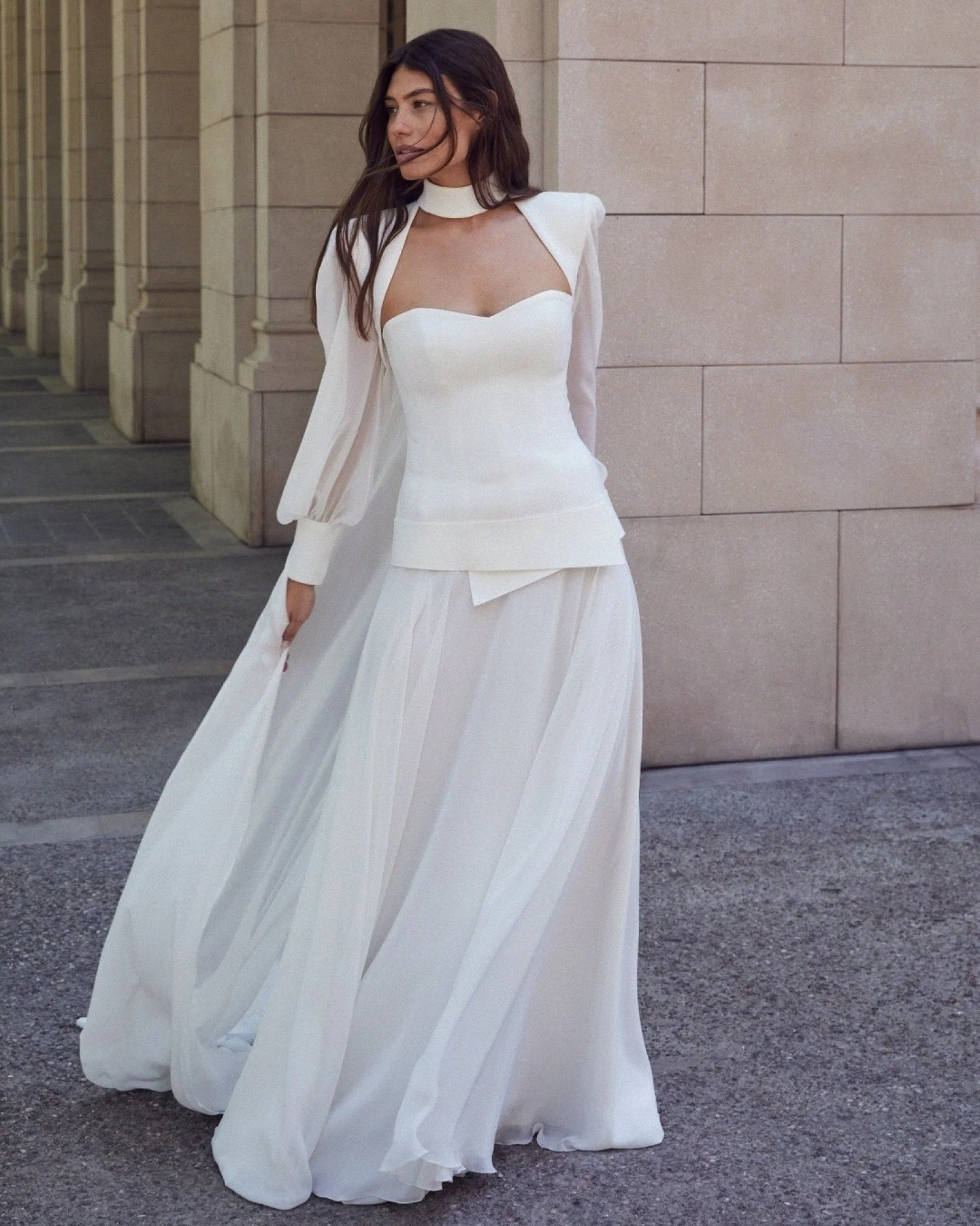 Introducing the ultimate show-stopper at &amp; Wolf Bridal: the 2600 is a Jesus Peir&oacute; masterpiece. ✨ Strapless with a sculpted bodice and drop waist cinched by a sleek belt, it flows into a dreamy chiffon skirt that moves with every step. Laye