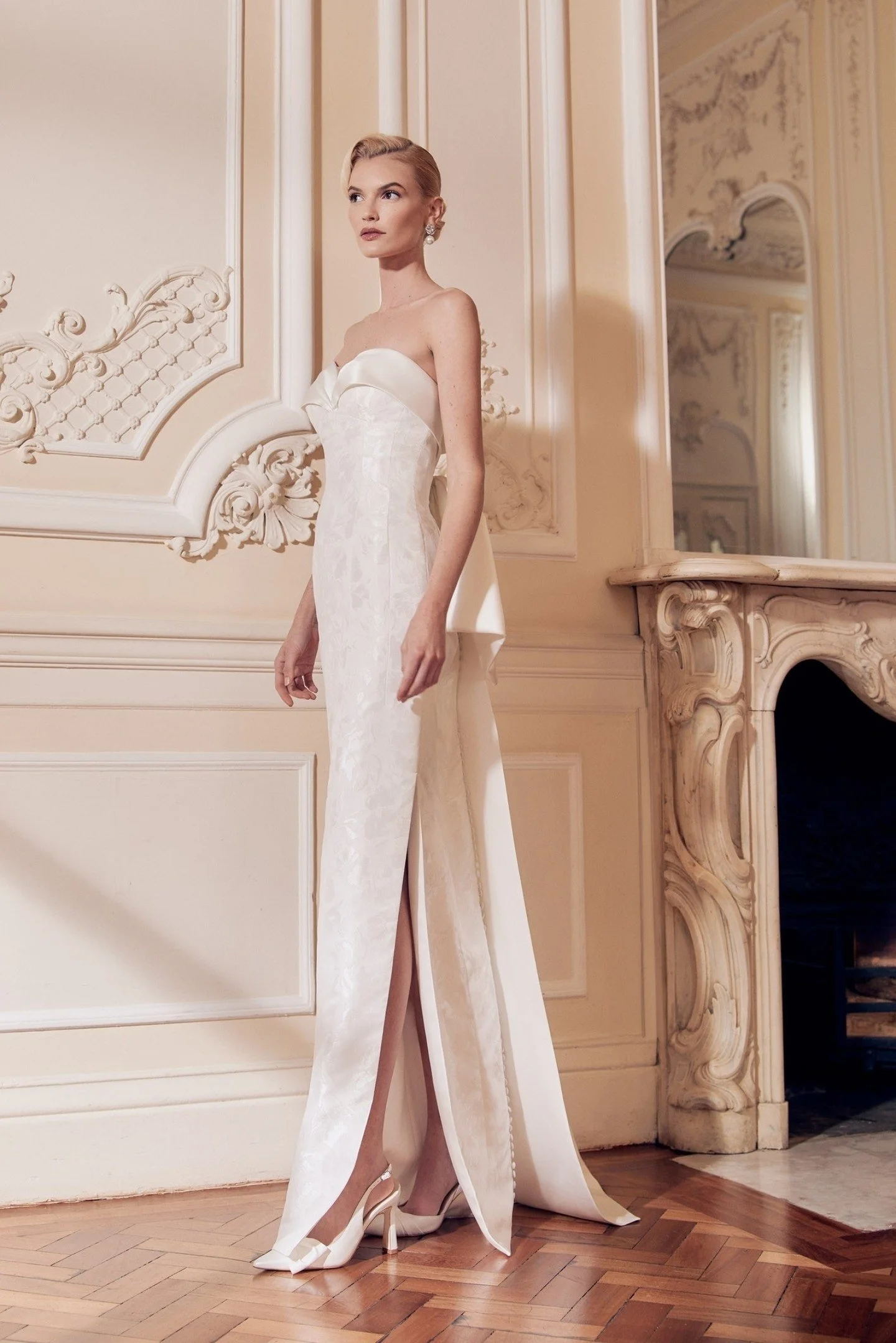 Undeniably romantic. 
Meet Frances &mdash; a gorgeous Mikado gown that glides over the figure in a refined column silhouette. With no train, her clean lines create a modern, minimalist statement, while her contrasting satin sweetheart neckline frames