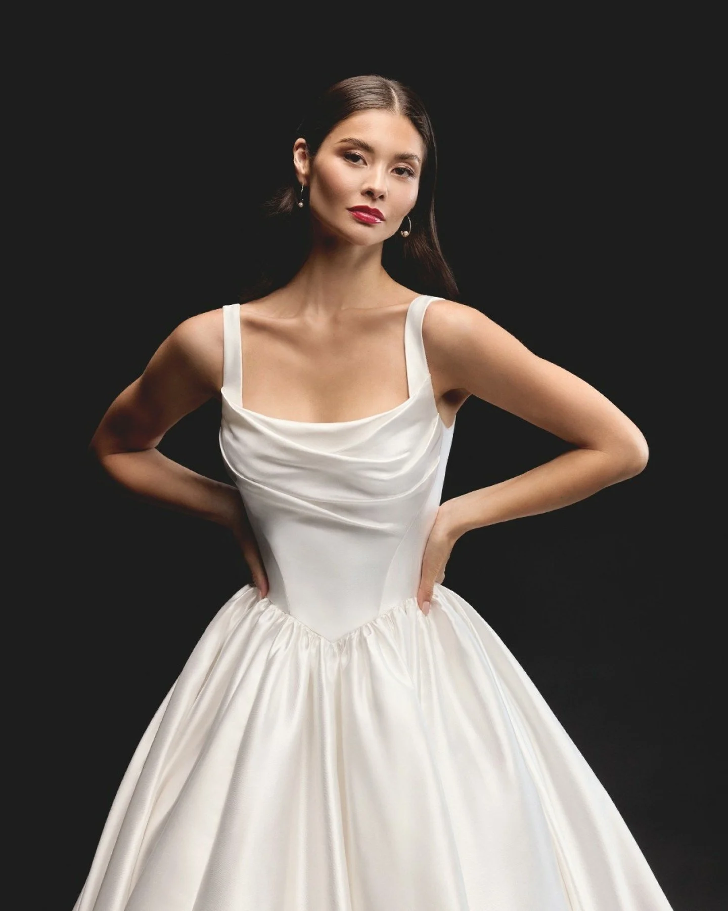 Say hello to Maris by Justin Alexander Signature &mdash; the kind of gown that makes your everyone go WOW. 

Crafted in luminous Mikado, she features a clean square neckline, slim straps, and modern pleating that sculpts the bodice beautifully. The c