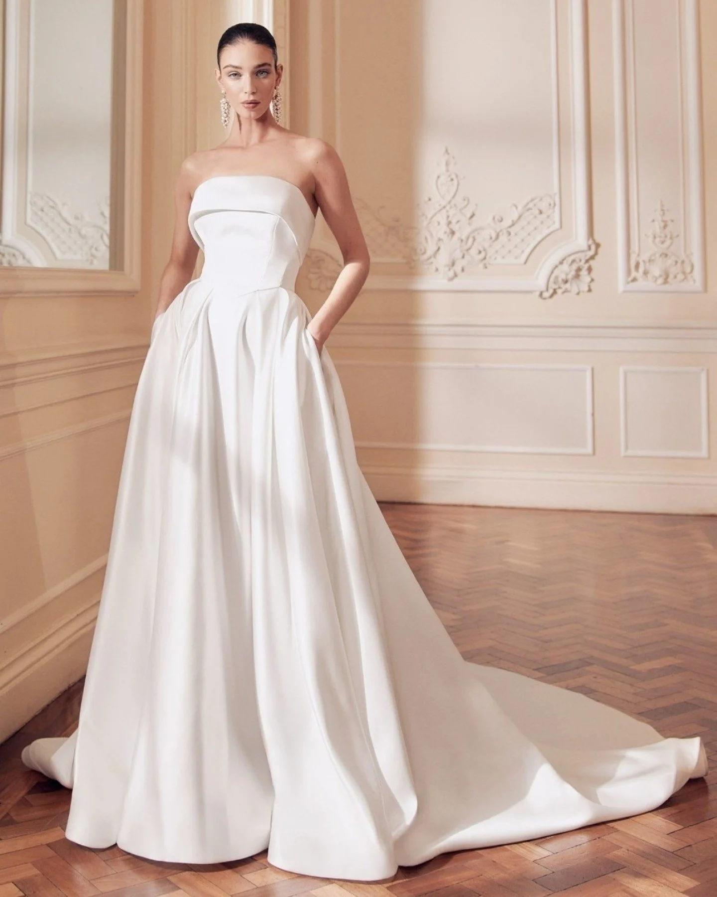 Brides are often surprised by what they find on the sample rail.

Dress: Annabel in Jacquard Fabric
Designer: Ellis Bridals
High Street Size: 14
Colour: Ivory
Condition: As New
Price: &pound;865

This designer wedding dress is available to buy Off-th