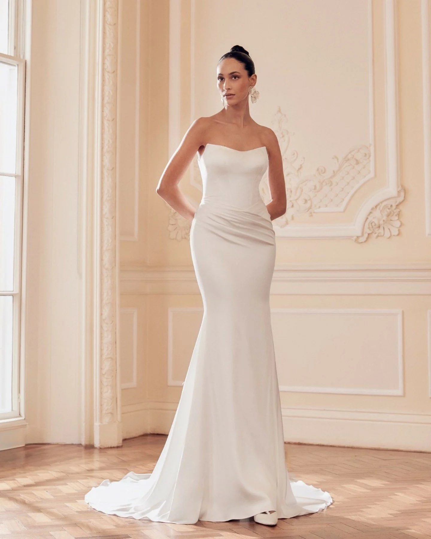 Dress: Athena
Designer: Ellis Bridals
Fits Like a Size: 10 
Colour: Ivory
Condition: As New
Was: &pound;1600 Now: &pound;800

The Michaela cape is available to buy separately

This designer wedding dress is available to buy Off-the-Peg at &amp; Wolf 