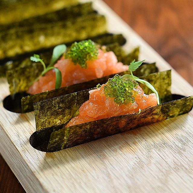 Spicy miso salmon nori taco with wasabi tobiko and coriander........these simple delicious canap&eacute;s are inspired by working with the amazing Taiji Maruyama @beaverbrook......super healthy and so yummy. Photography by the awesome @thegaztronome 