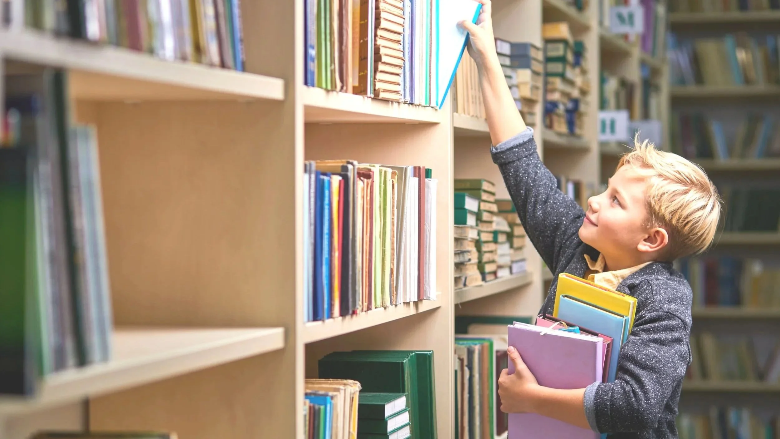 boy wiht books.jpg
