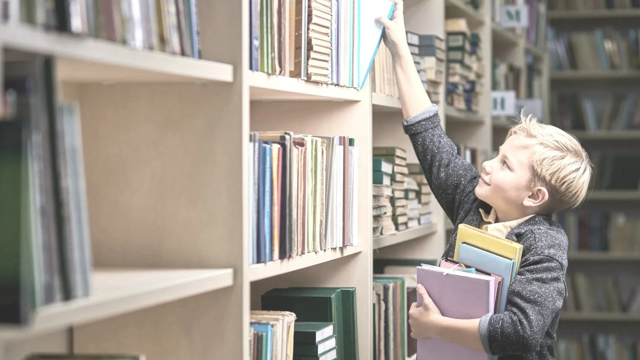 boy wiht books.jpg