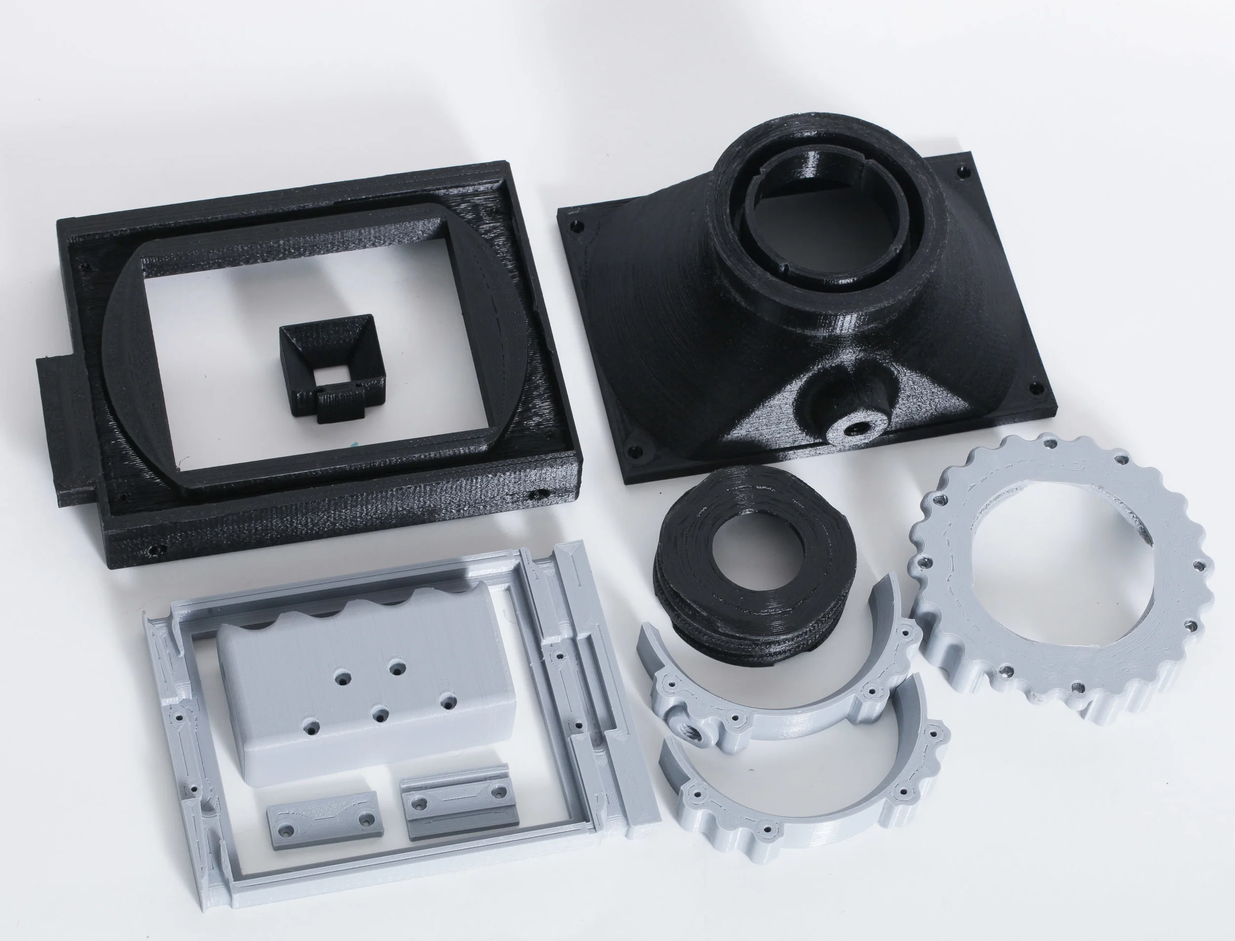 #30 - not sure where this should fit.  all the 3d printed pieces. disassembled camera -  IMG_0934.jpg