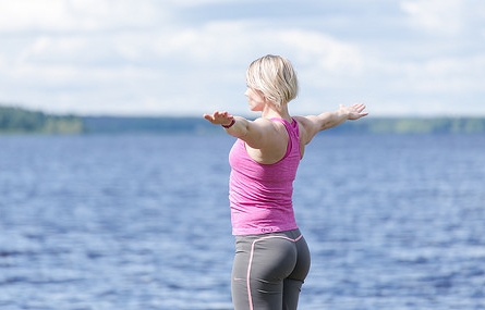 Practice yoga by the lake