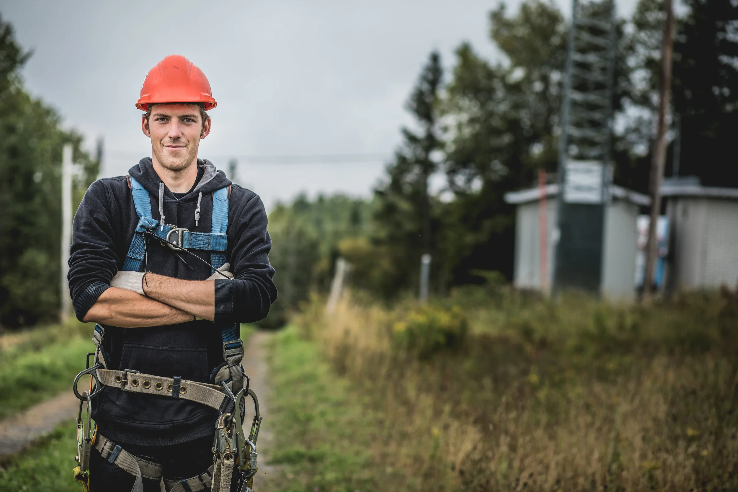 cheerful-technician-at-telecom-tower-P79JDCM.jpg
