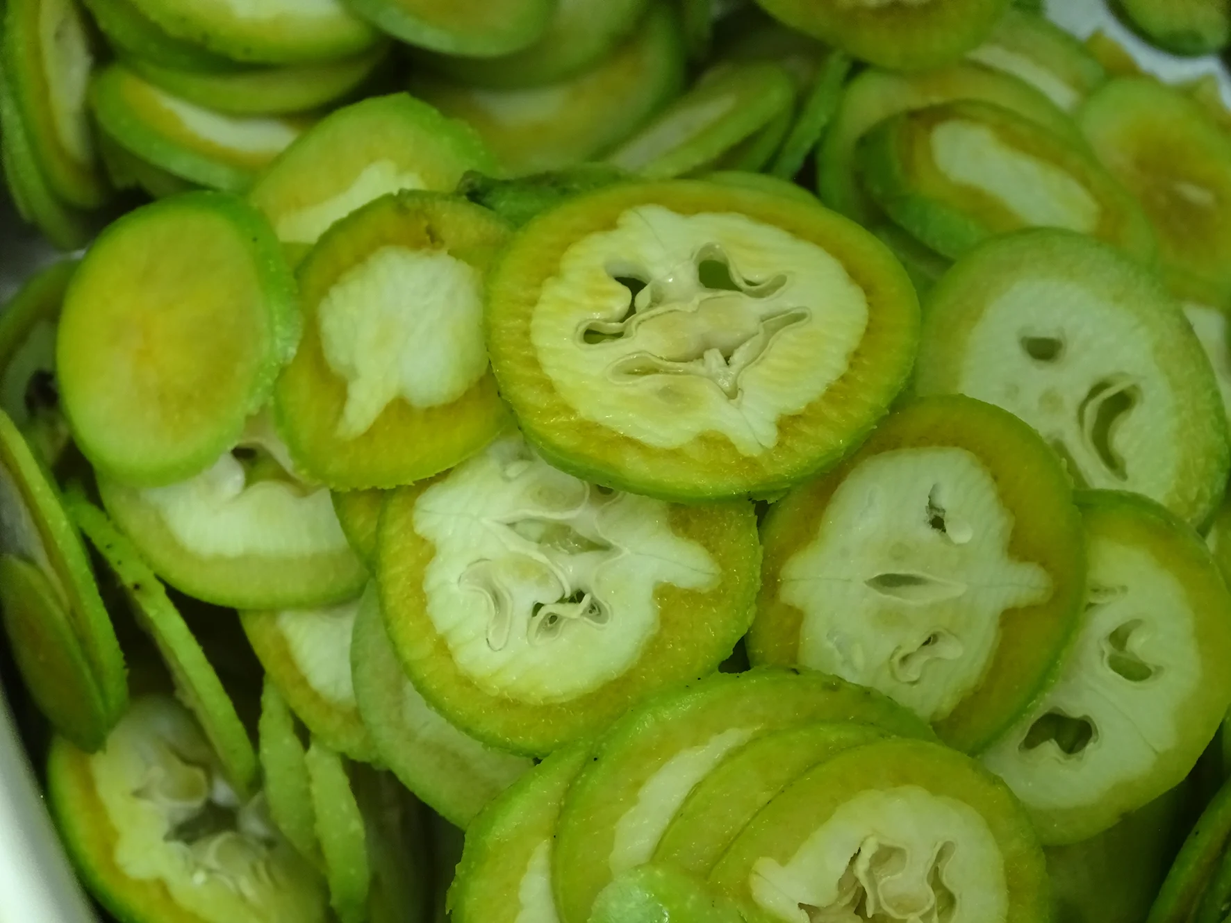  Green walnuts, sliced and ready for pickling. 