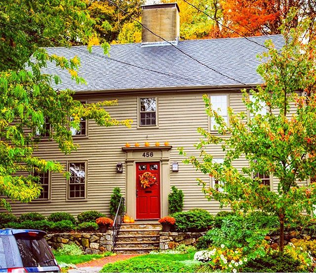 Built circa 1737, this is the A. L. Filfield House house on Main Street in Amesbury, MA, all decked out for fall 🍁🍂🍁🍂. The house is two stories high, five bays wide, with a steep gable roof and that classic central chimney. Though modest, it has 