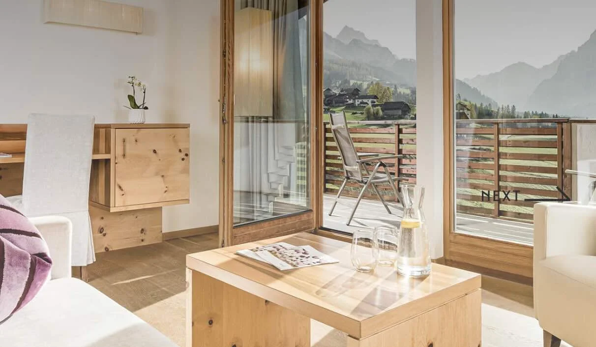 A hotel balcony looking out over the Dolomite mountains at a Thrive yoga retreat