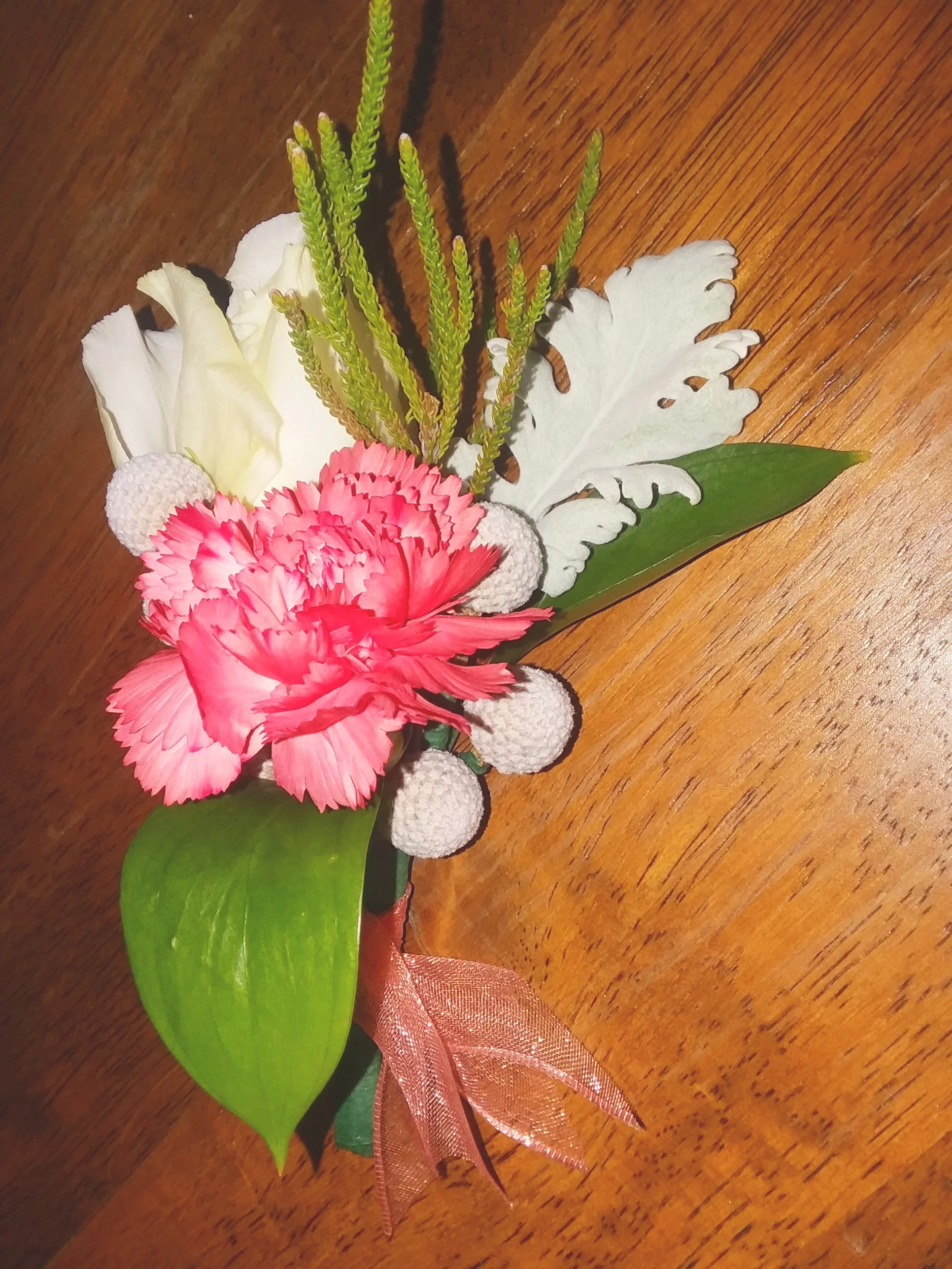 Peach and coral wedding boutonniere