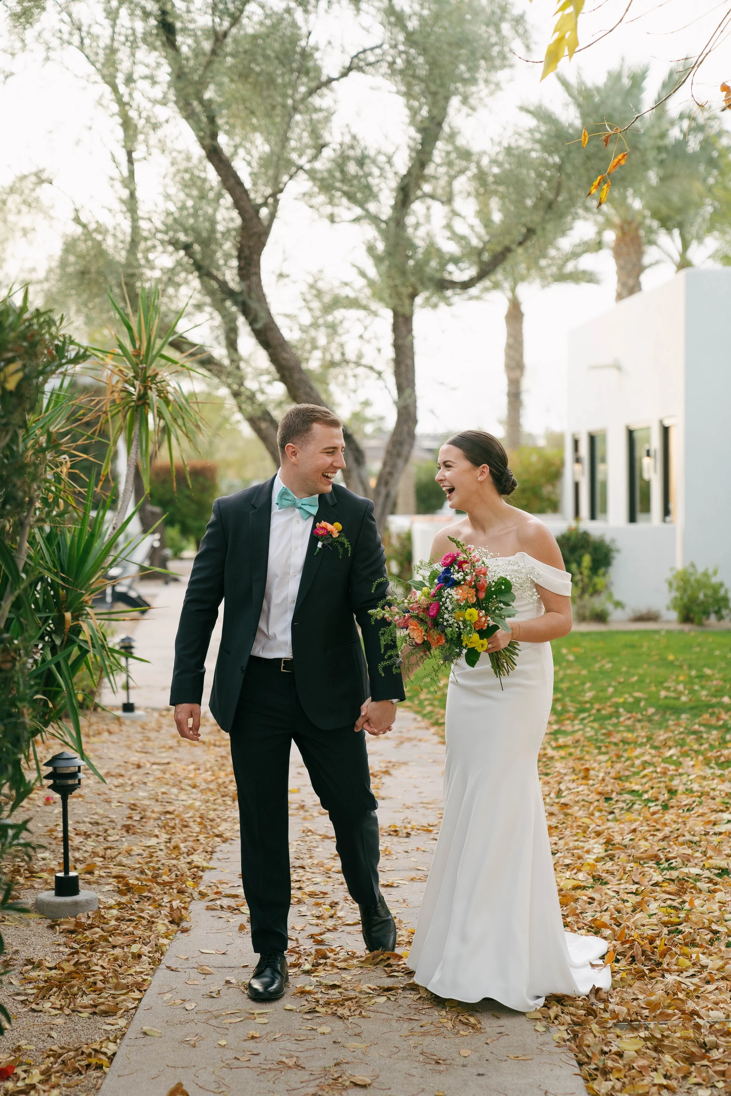 Laughing bride and groom