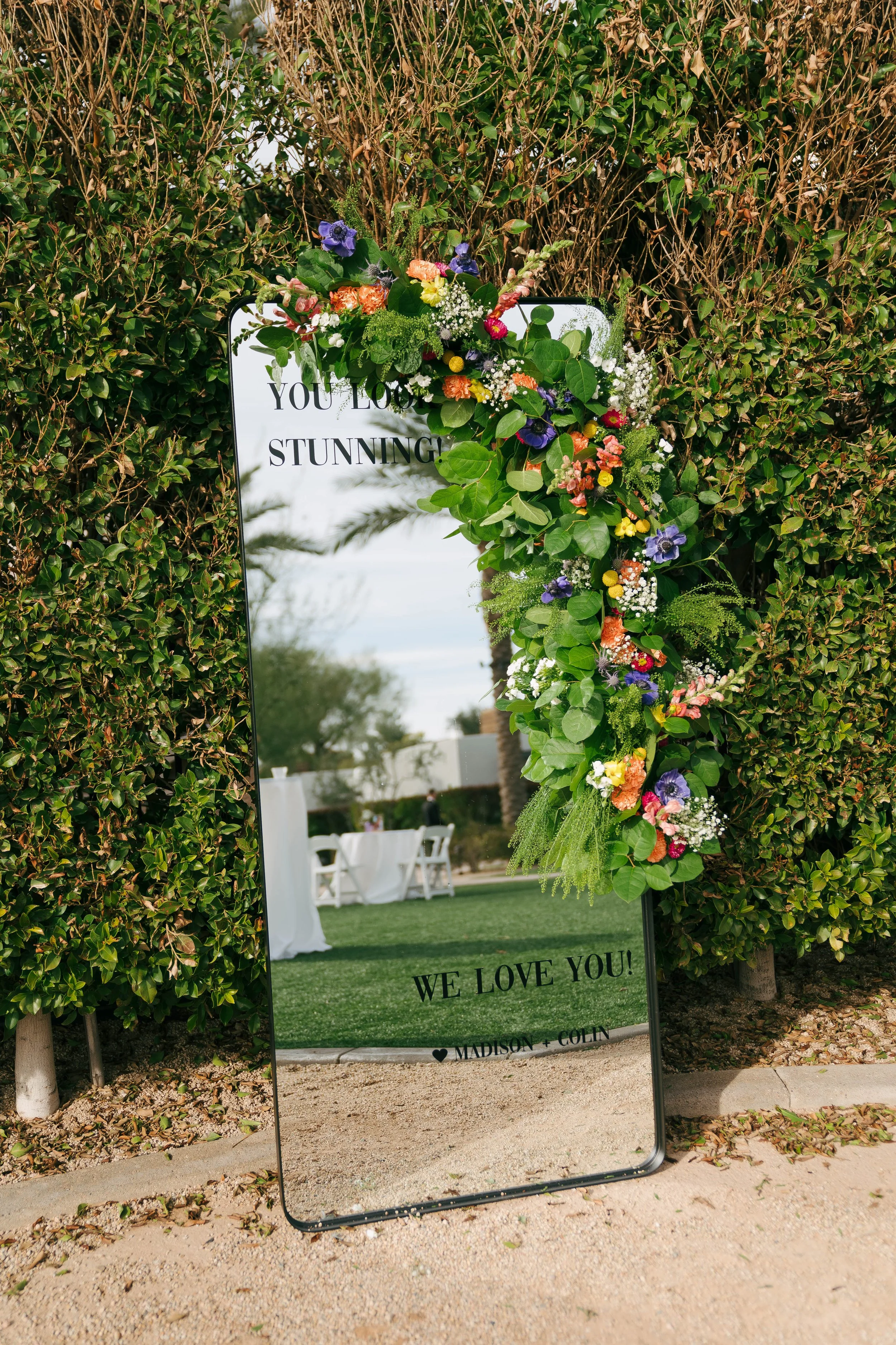 Mirror with floral garland