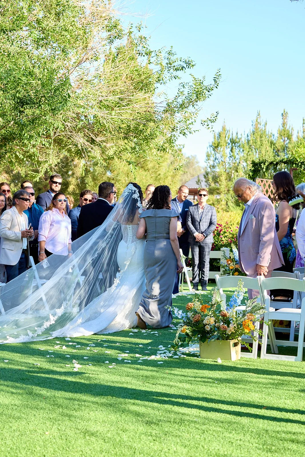 Aisle marker flowers at garden wedding