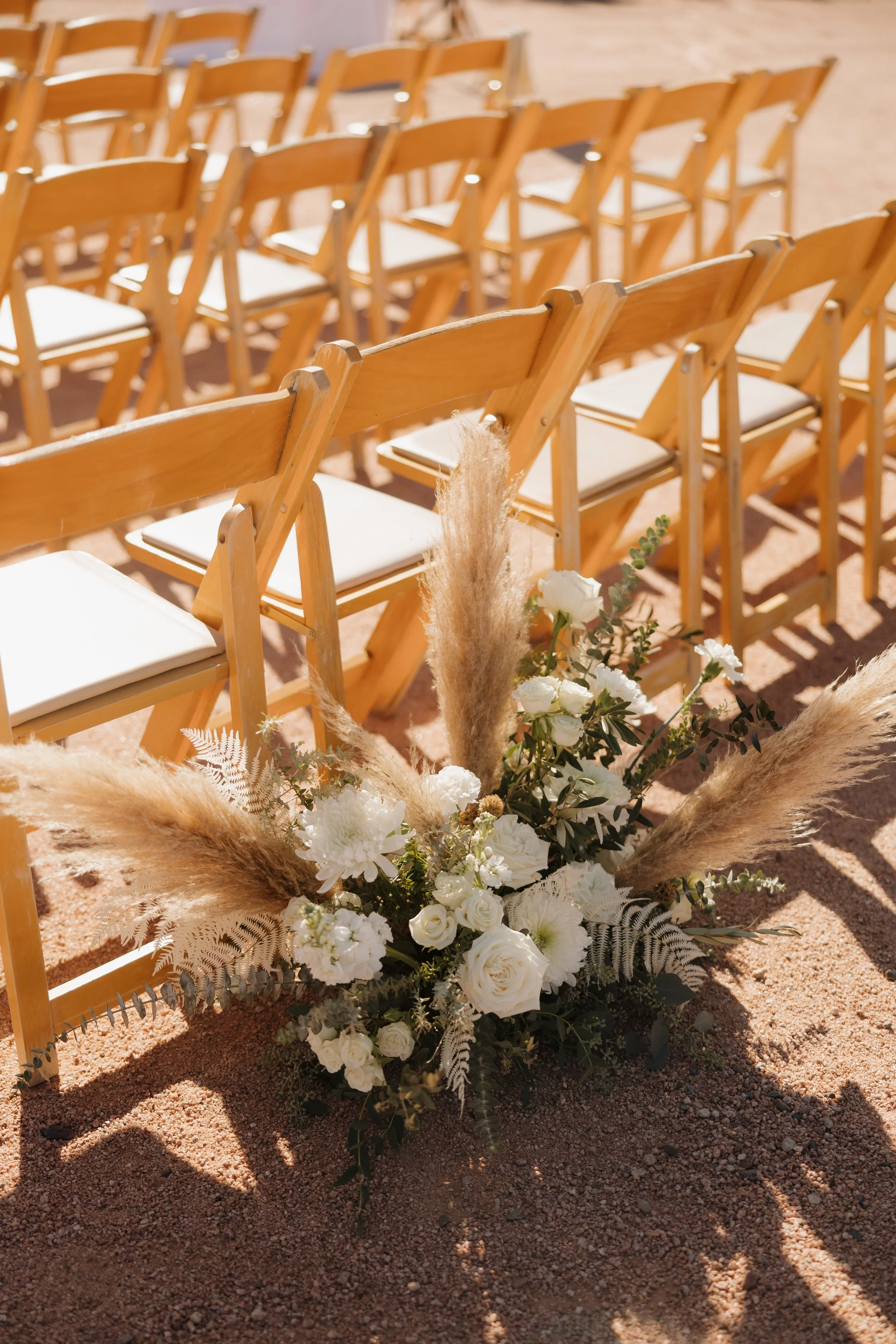 Rustic aisle marker flowers