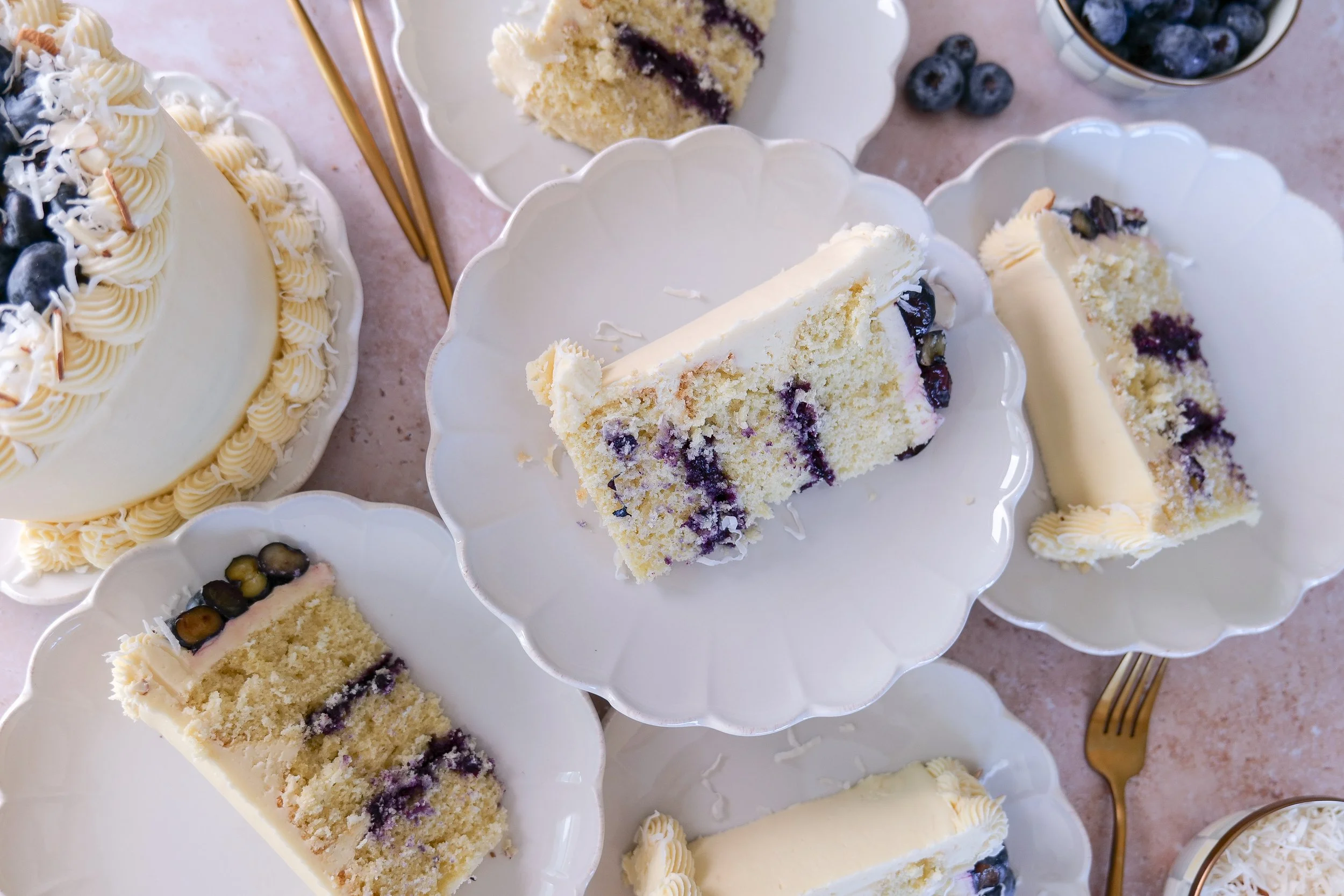 Close-up of homemade blueberry curd filling between cake layers.