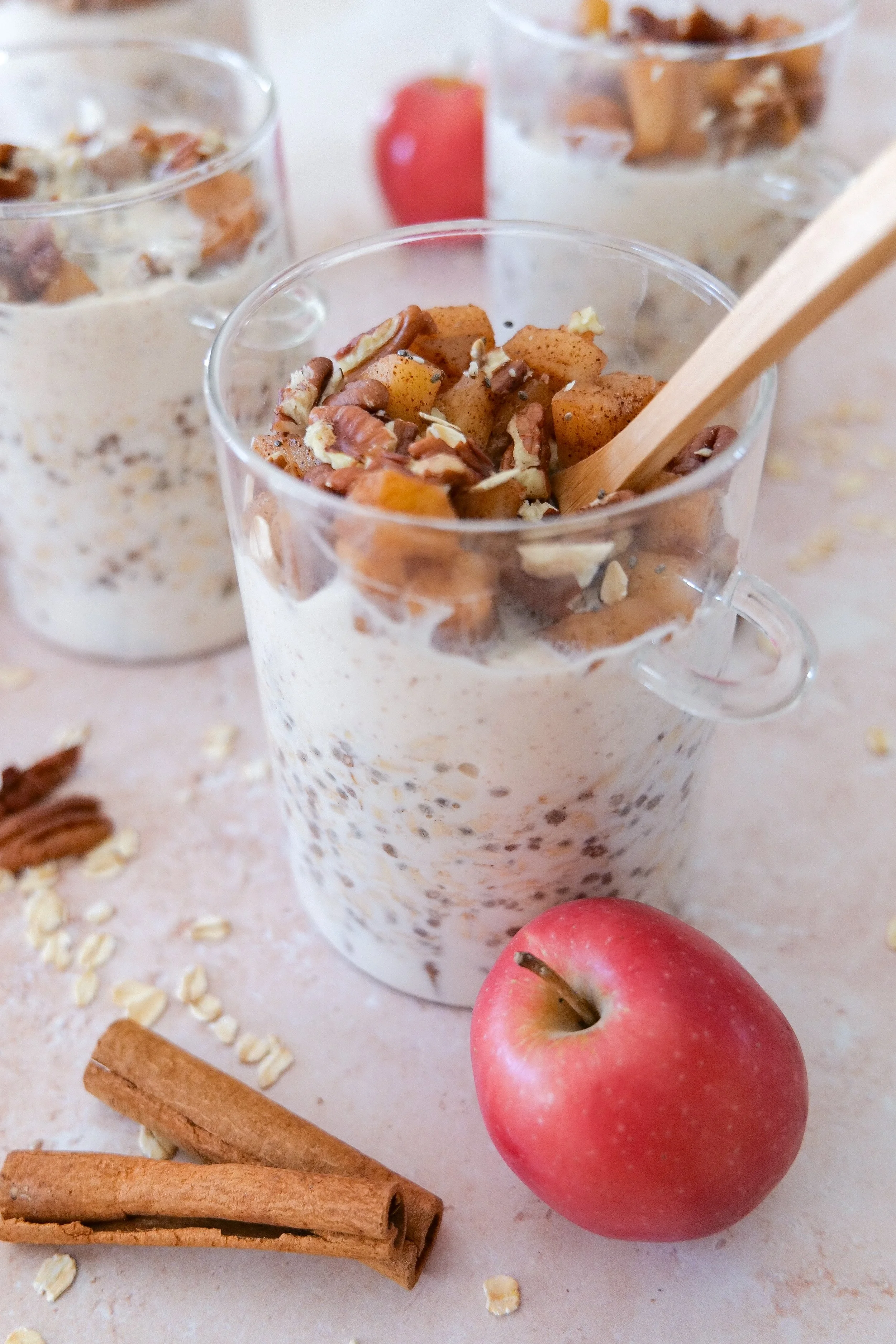 Layered apple pie overnight oats with cinnamon apples, oatmeal and creamy Greek yogurt.