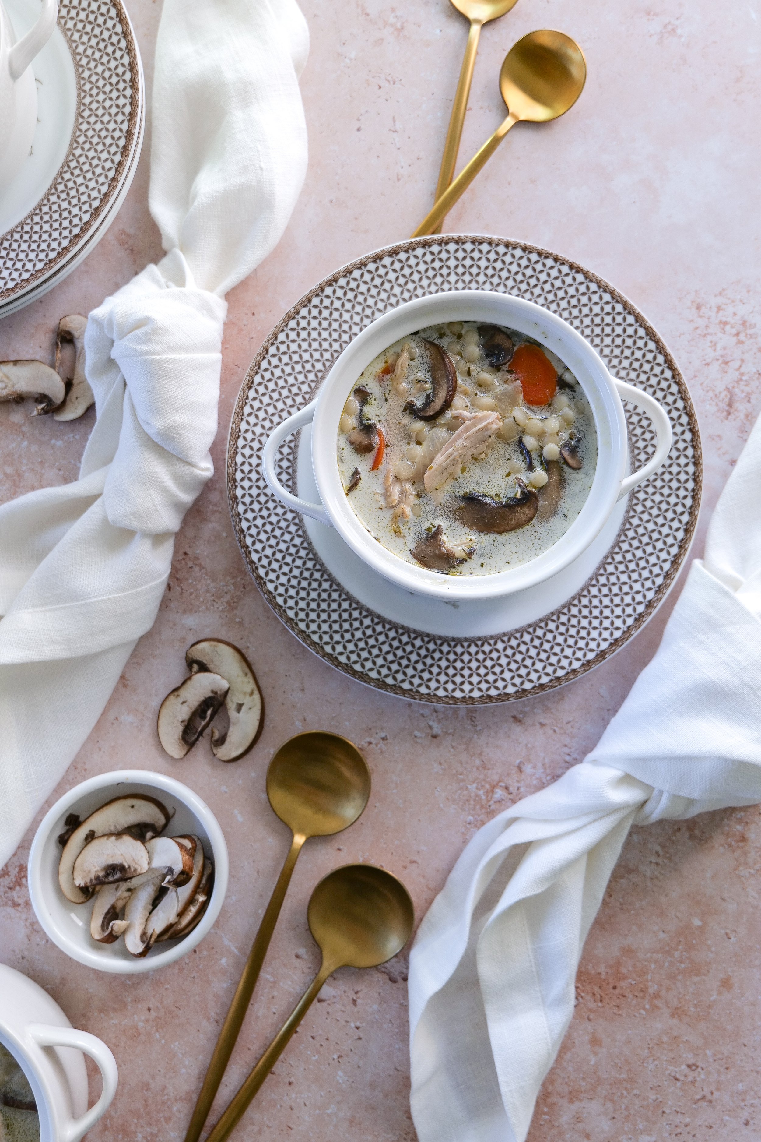 Creamy chicken mushroom soup filled with shredded chicken, carrots and couscous.