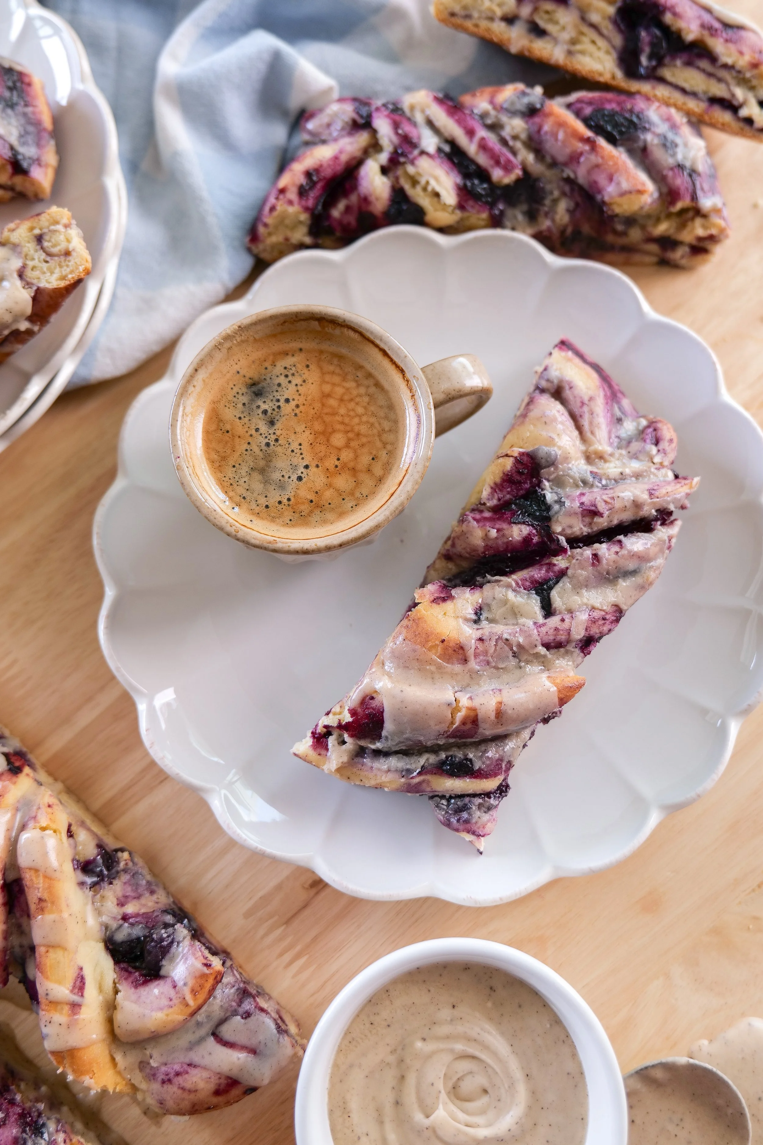 Blueberry cinnamon bread finished with a generous drizzle of brown butter vanilla icing.