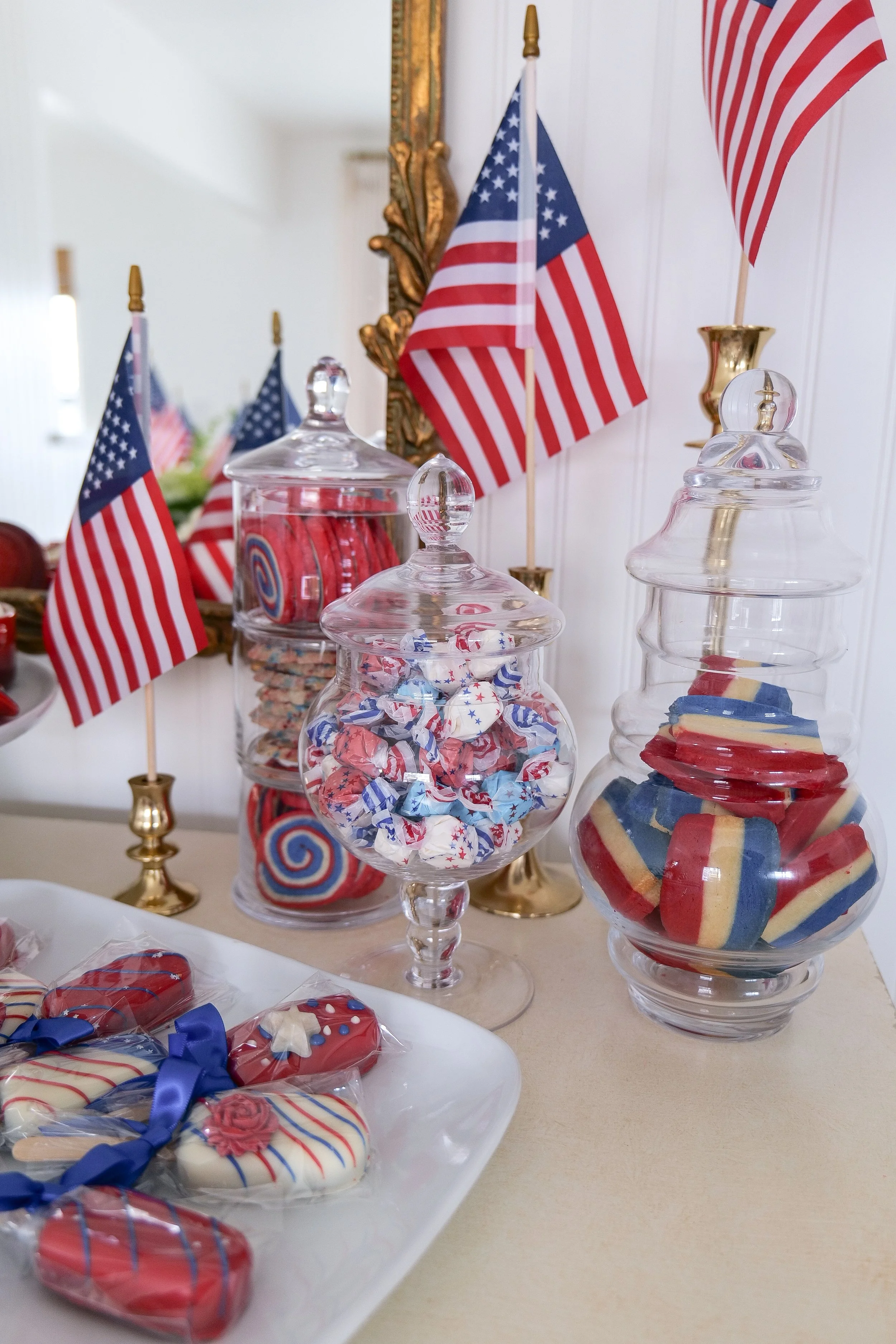 Summer entertaining decor arranged on a festive holiday table