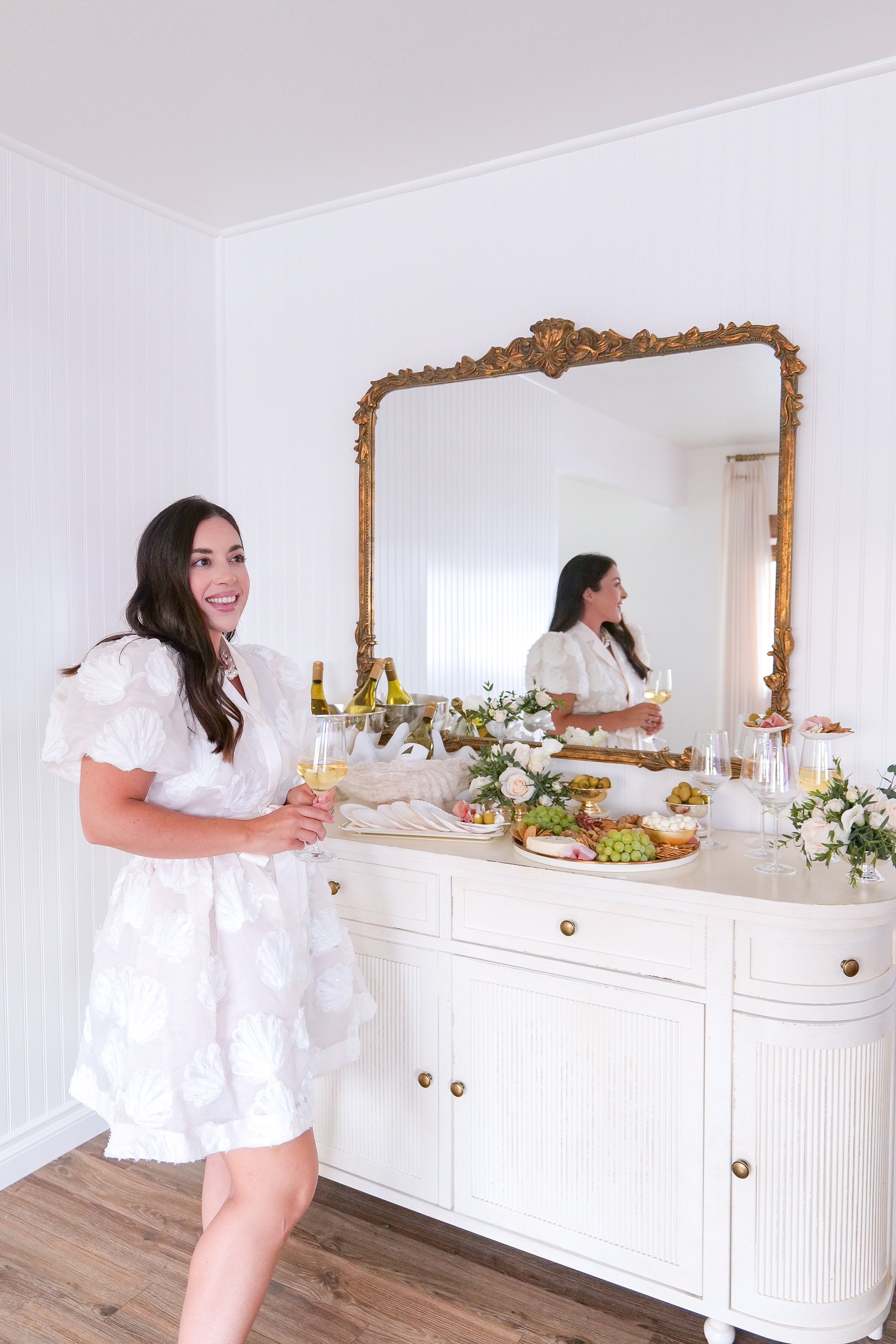 Effortless coastal summer entertaining outfit styled for a wine and charcuterie gathering