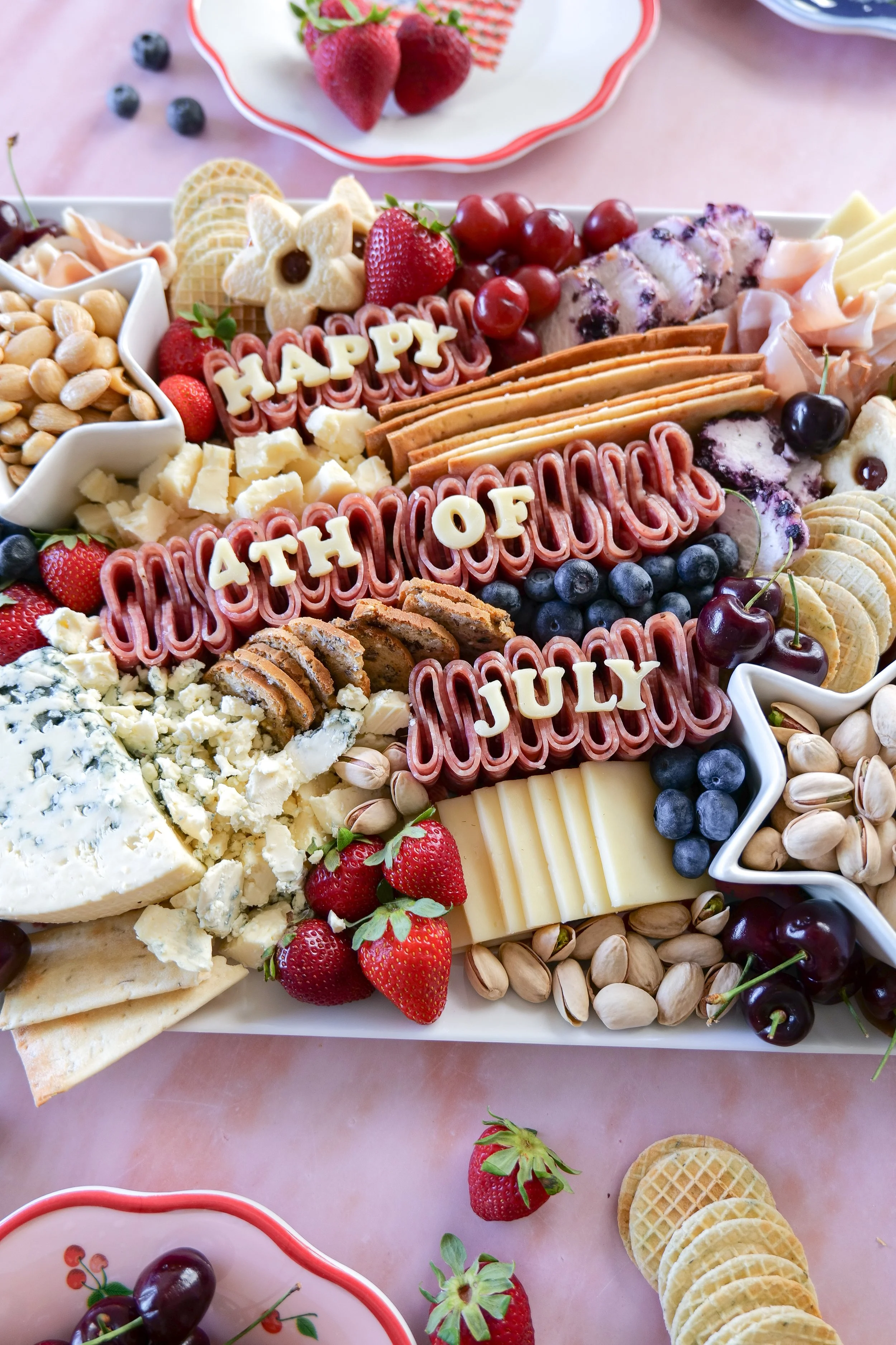 Patriotic snack board with festive ingredients for summer entertaining.
