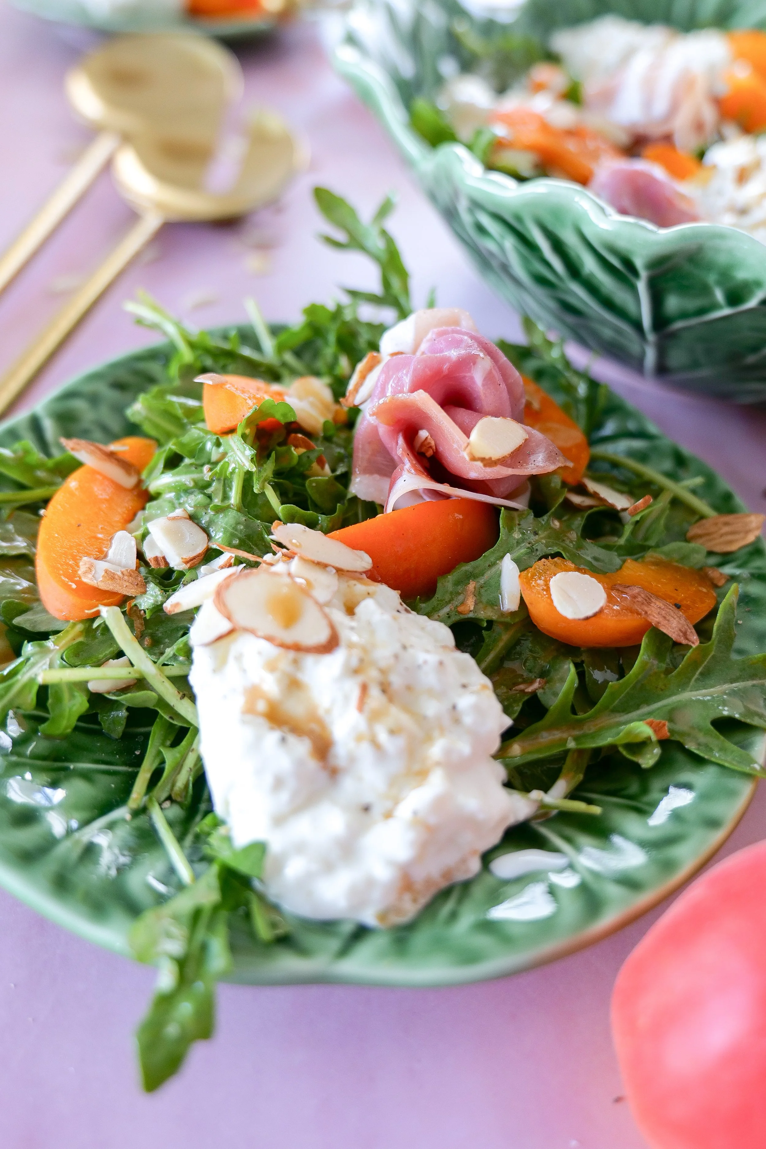 Elevated summer salad recipe with burrata and seasonal apricots.