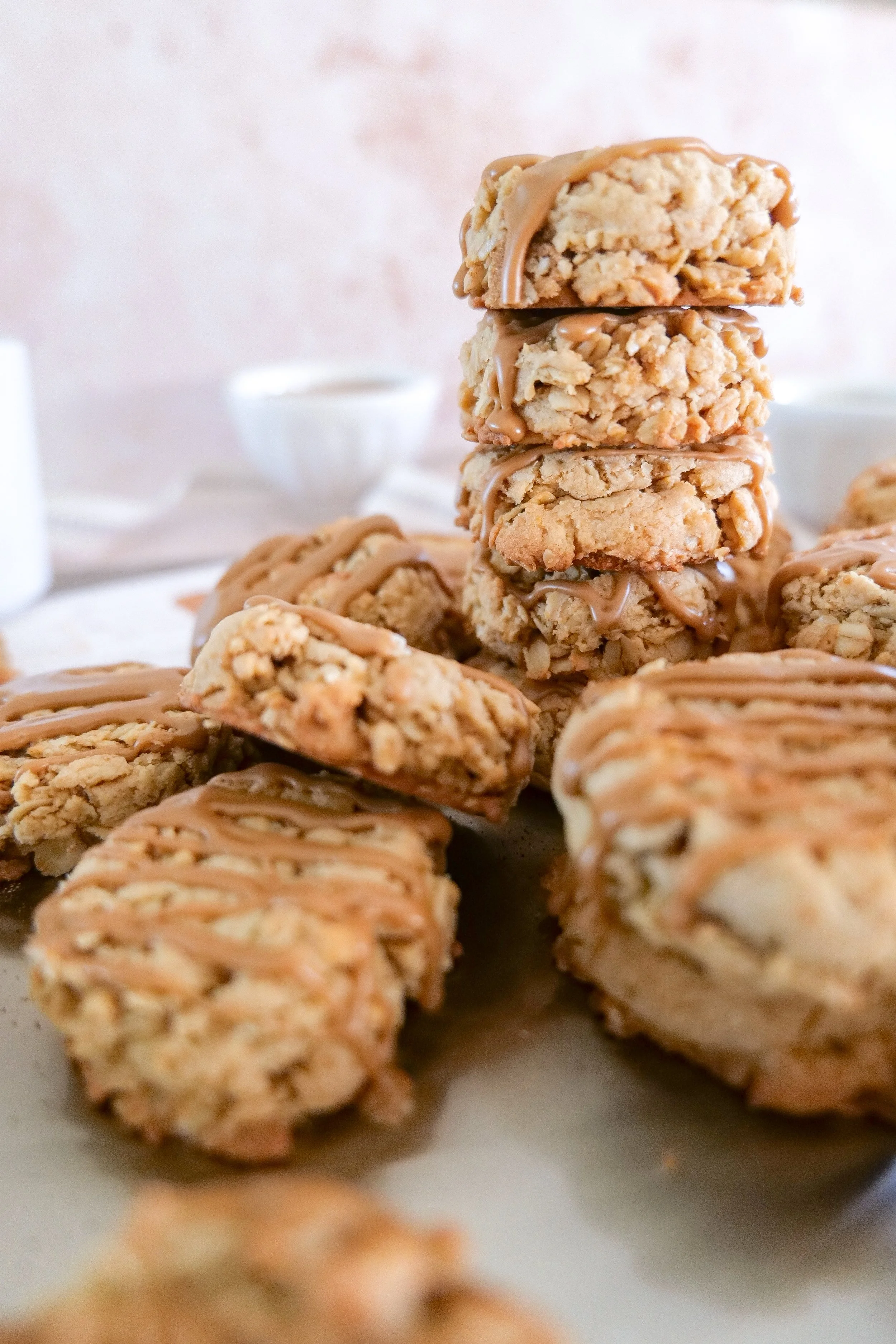 Brown butter oatmeal cookies with a sweet espresso drizzle perfect for enjoying with coffee.