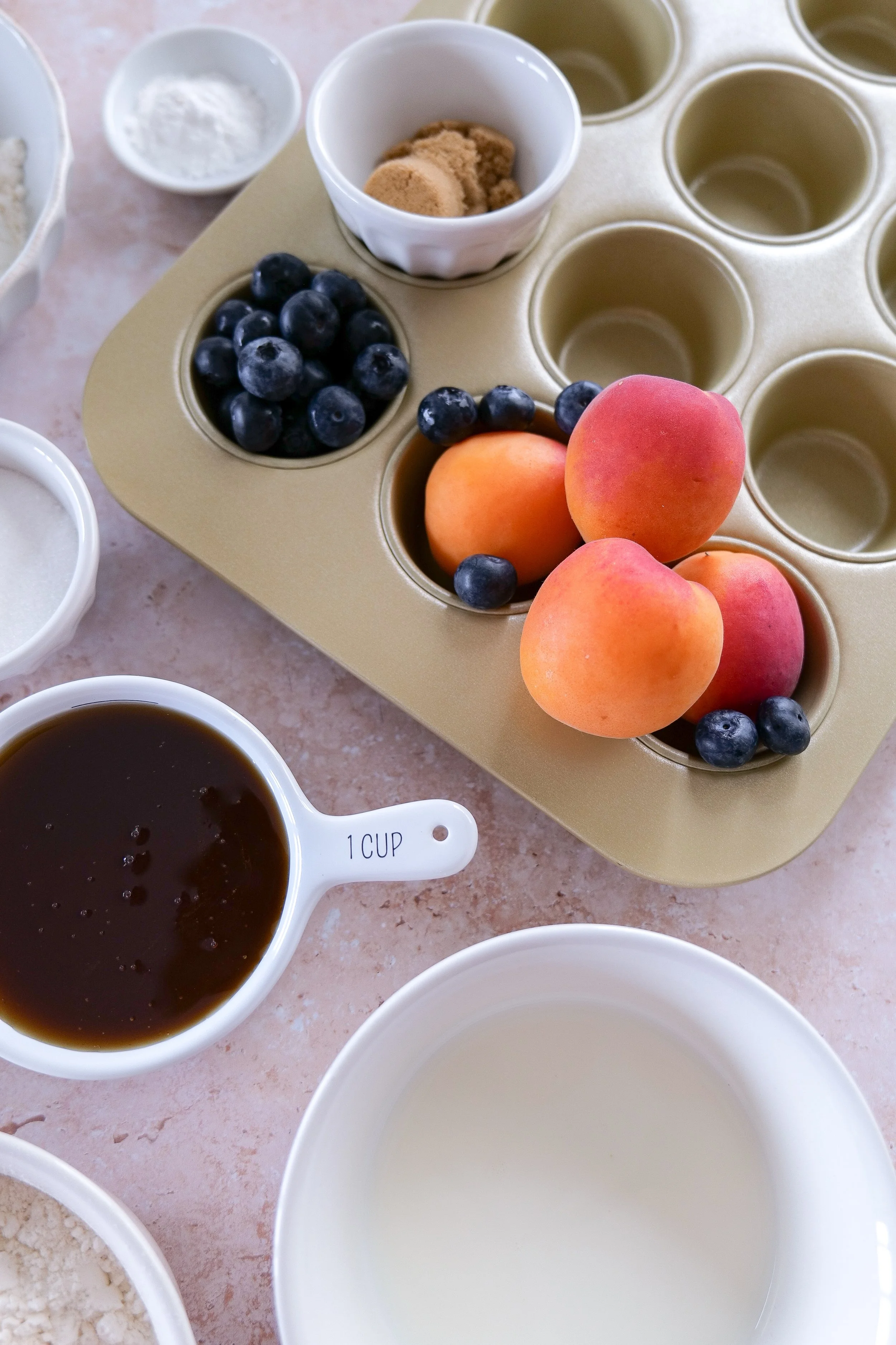 Easy fruit muffin recipe made with blueberries and apricots.