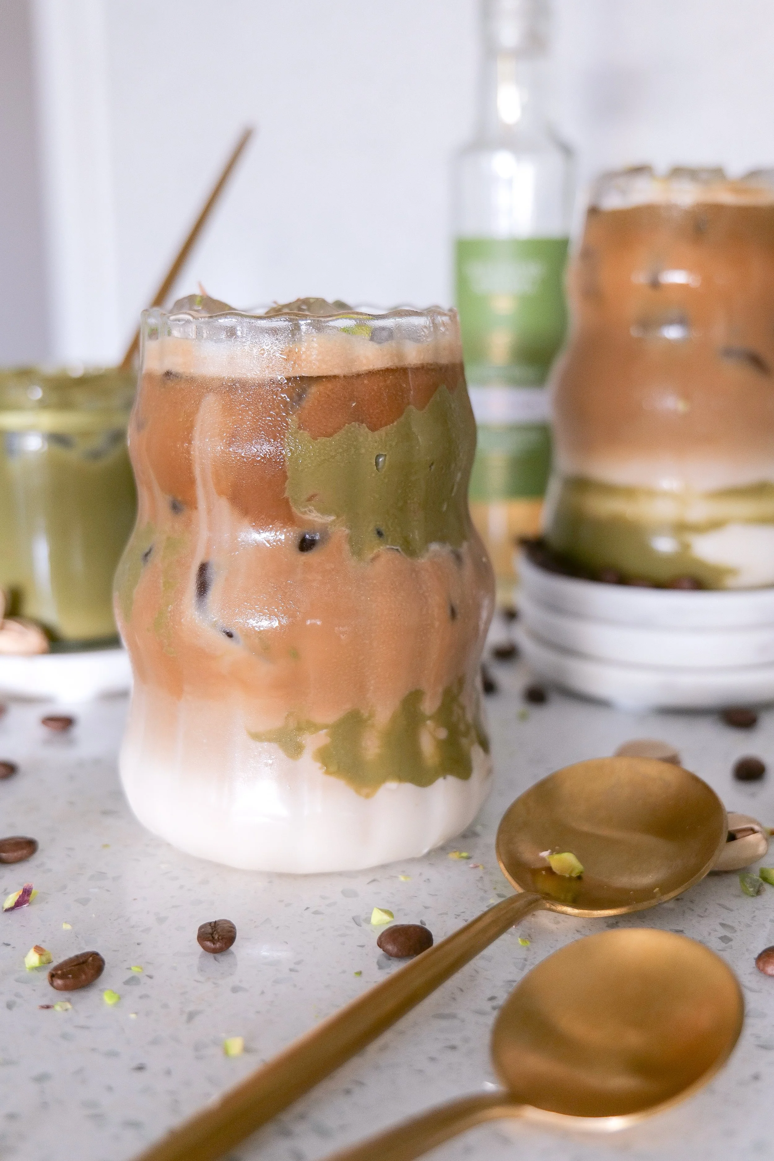 Homemade pistachio latte with rich espresso and a creamy pistachio milk mixture.