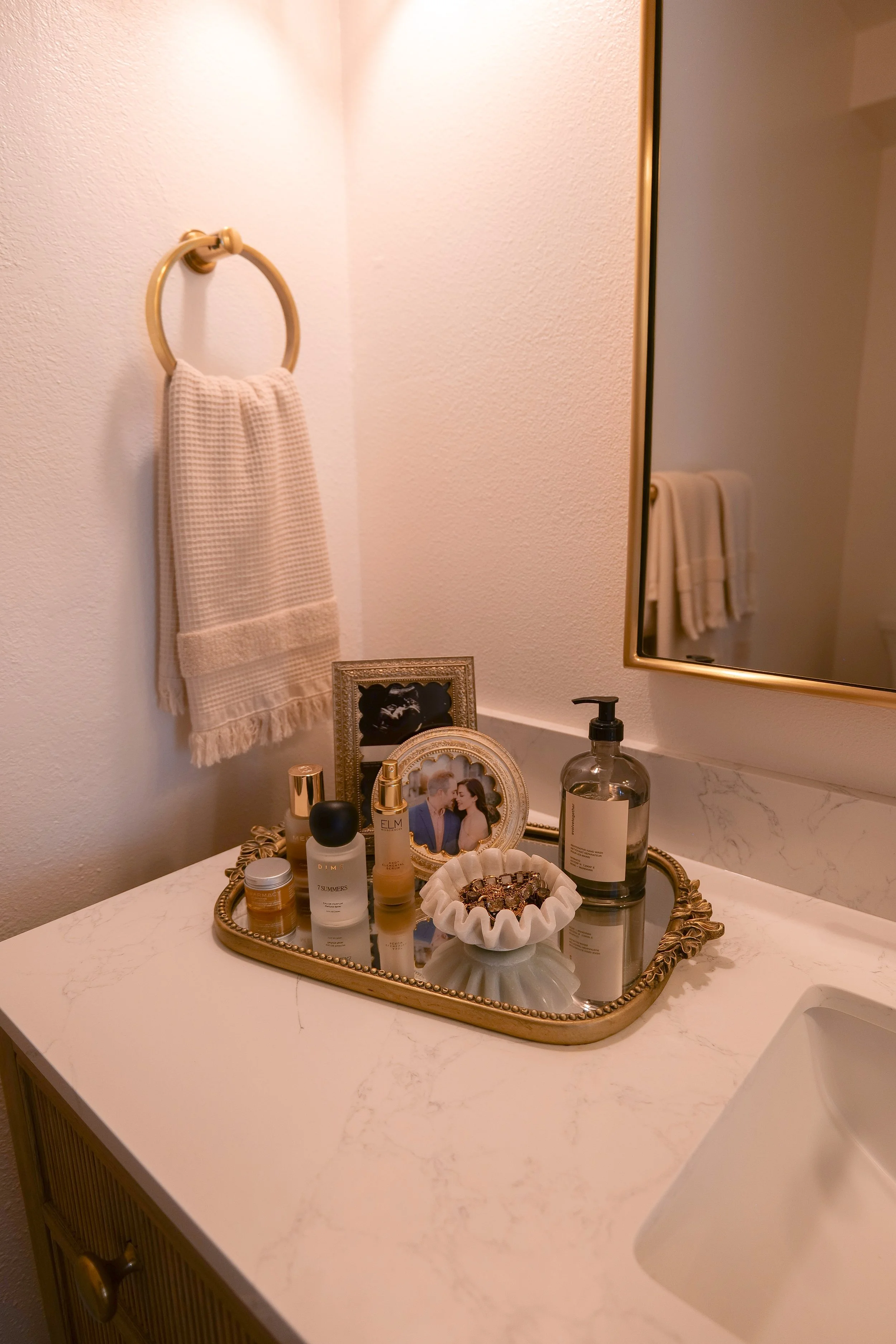 Close-up of decorative accents on the bathroom vanity countertop.