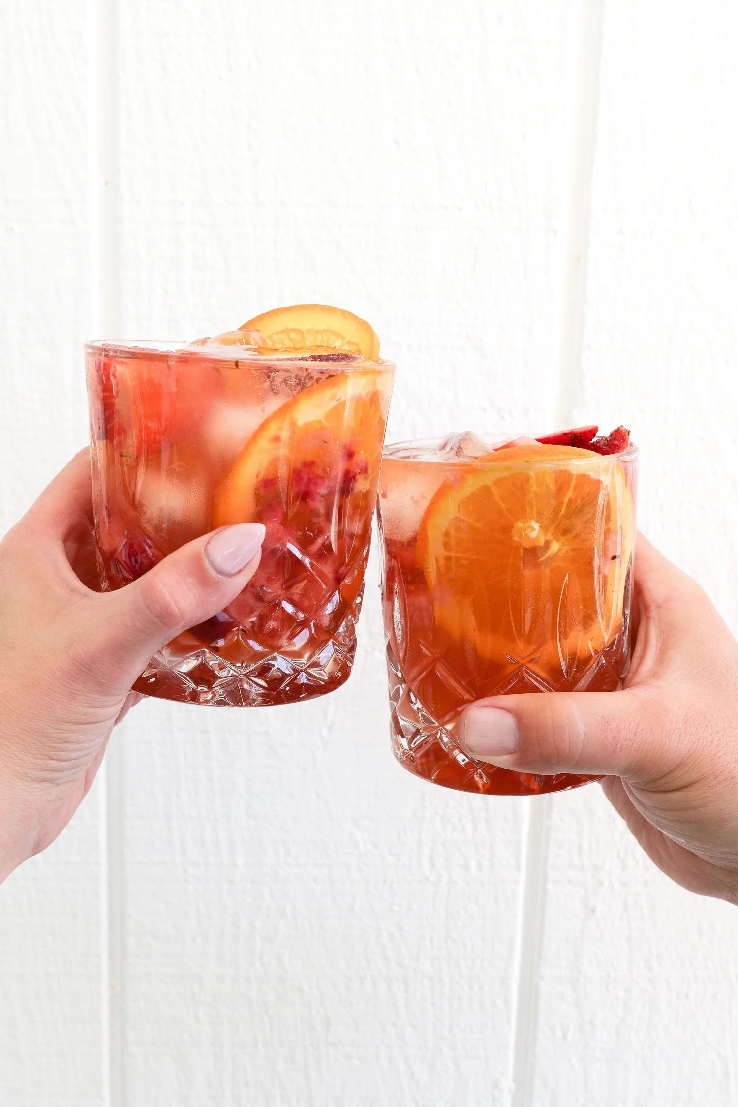 Strawberry orange bourbon smash with fresh fruit