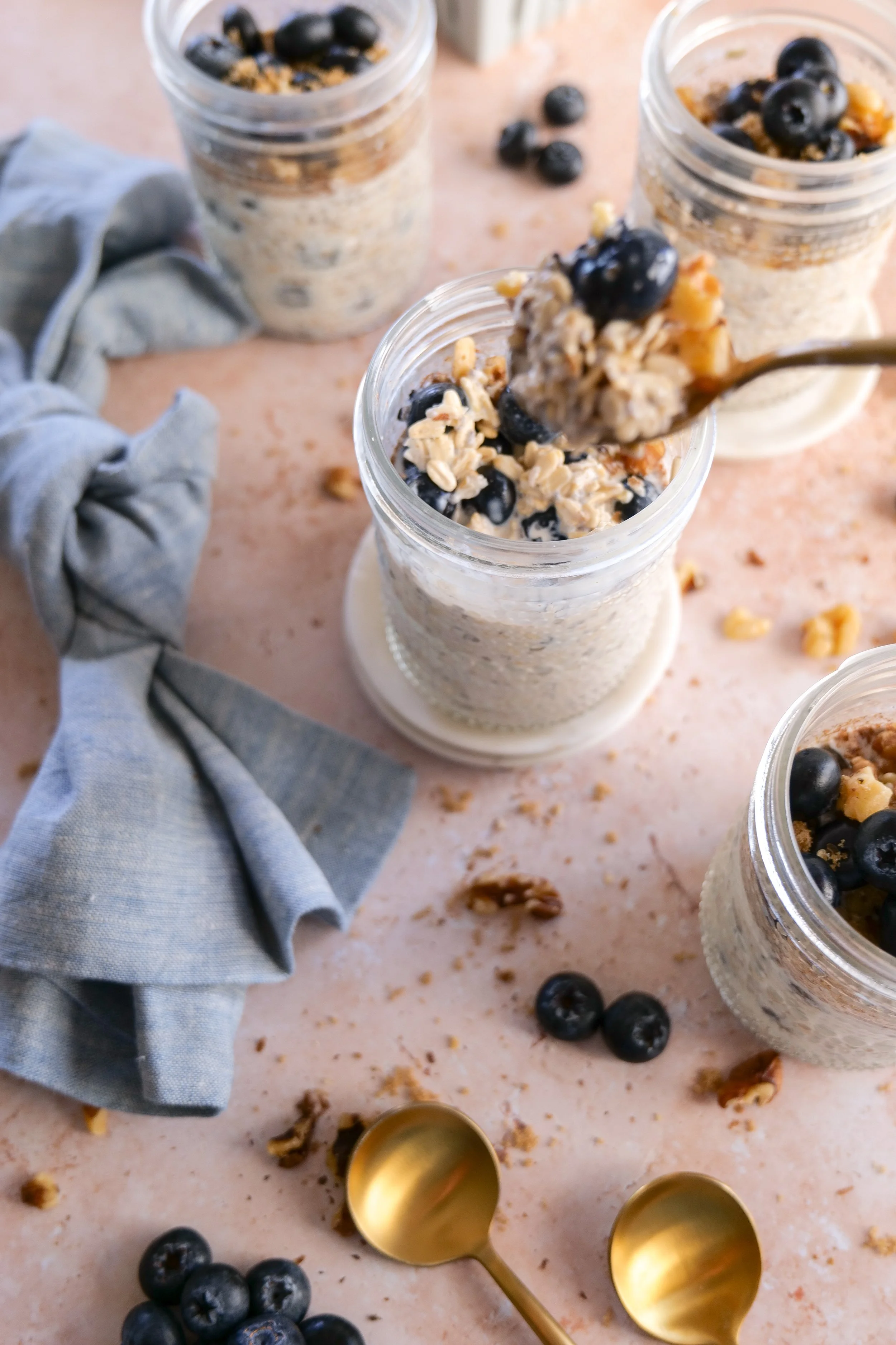 Mixing ingredients together for homemade Blueberry Pie Overnight Oats.