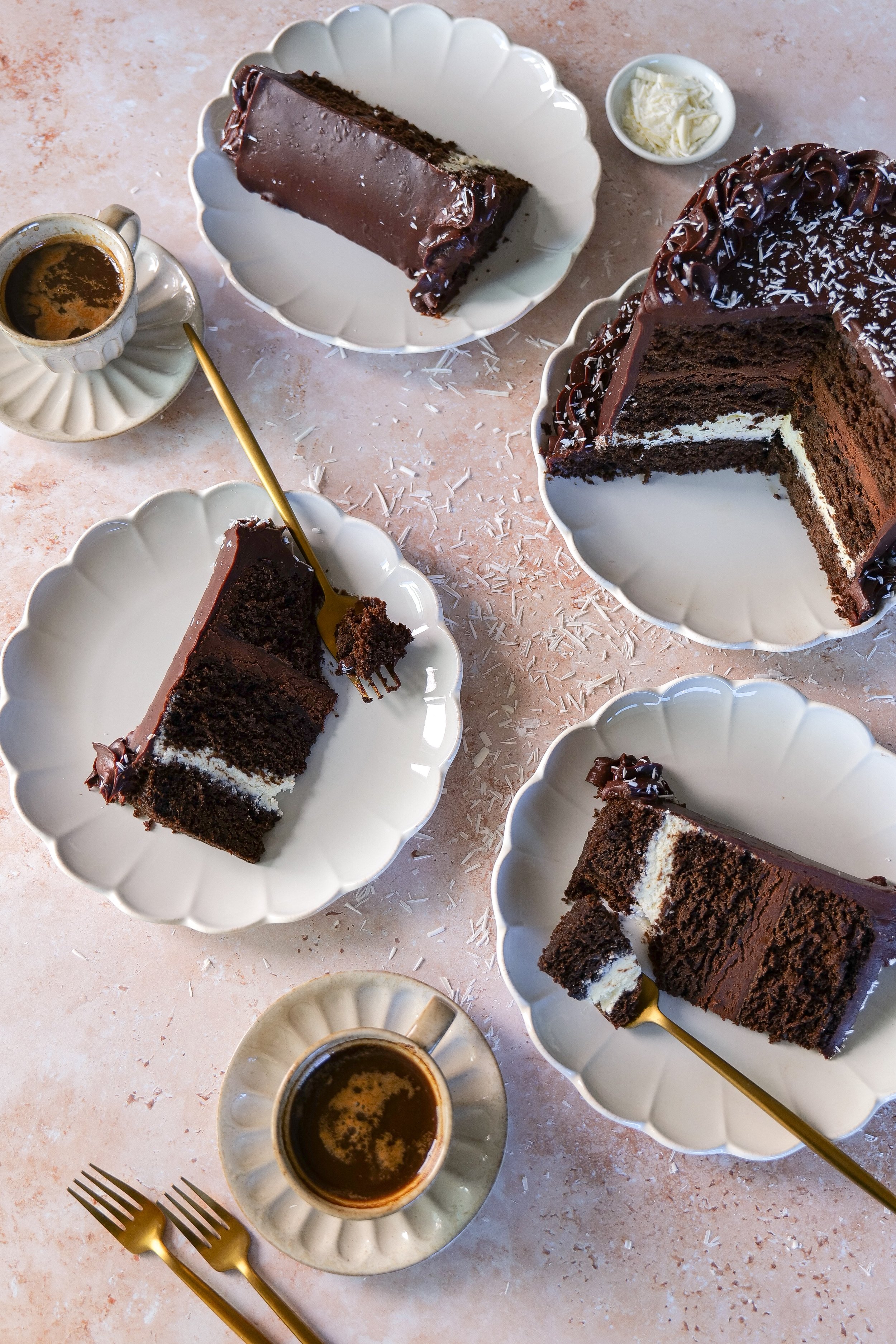 Chocolate layer cake with creamy white chocolate mousse filling and rich chocolate ganache.