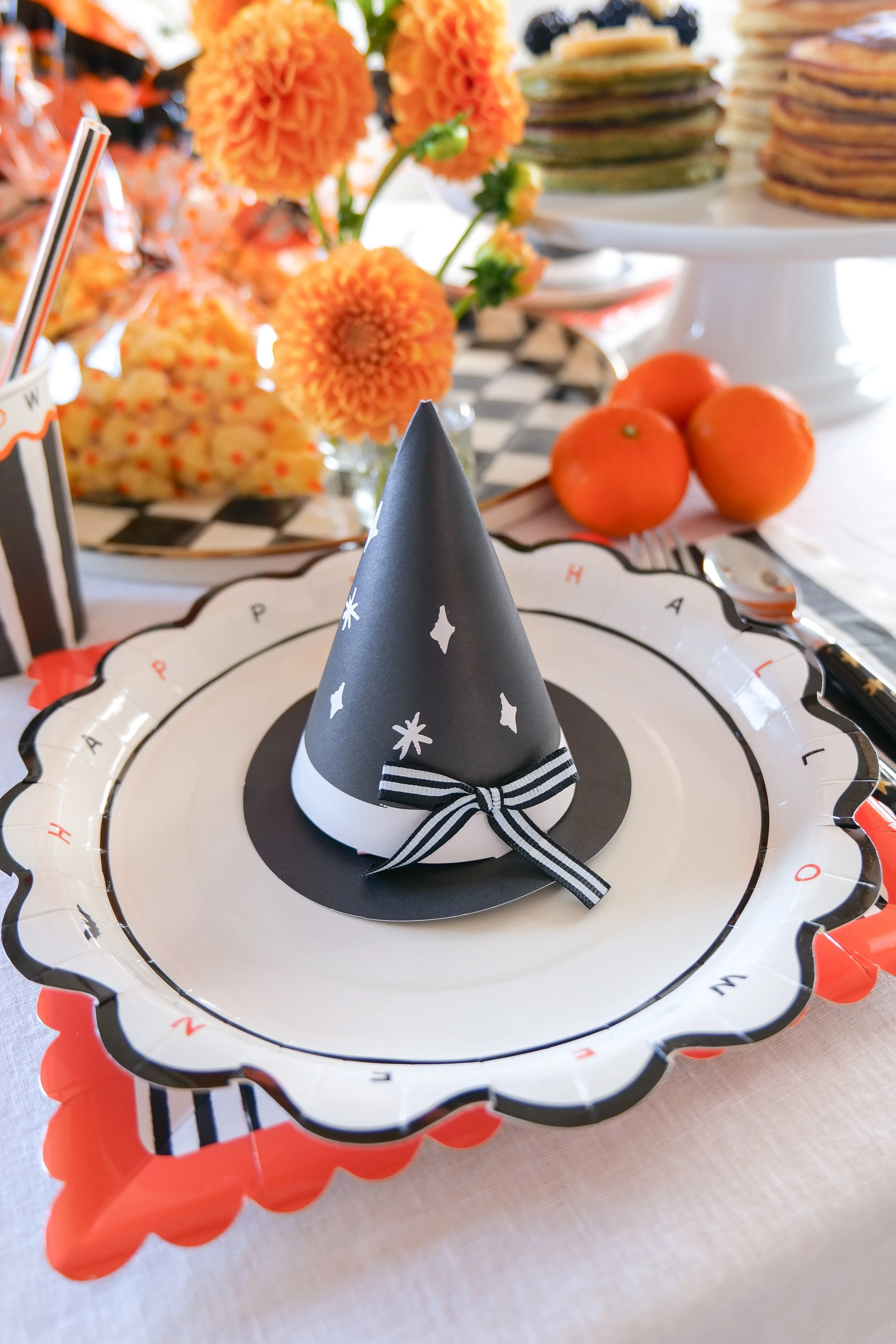 Witch hat Halloween favors filled with Little Spoon Bars for kids.