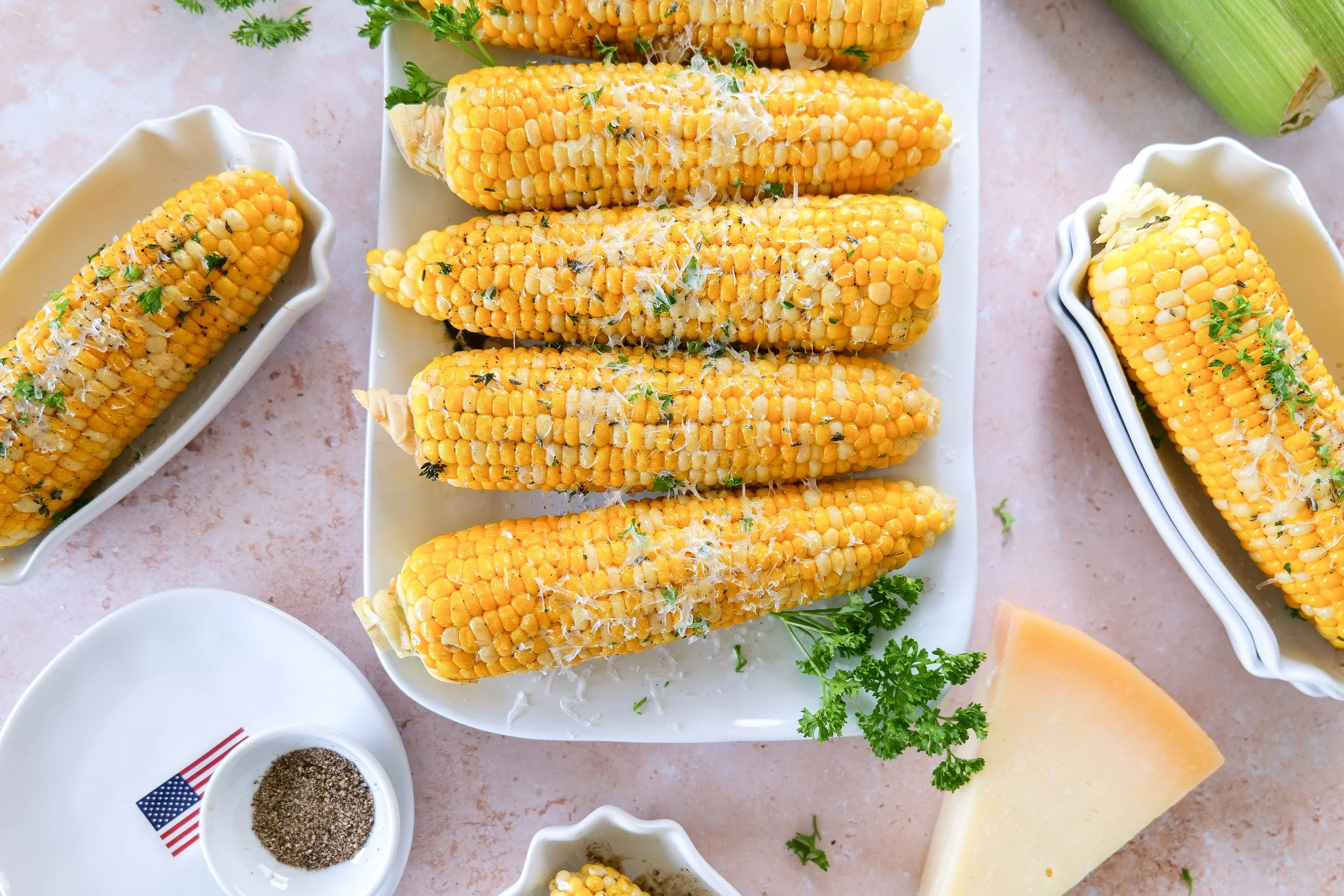 Patriotic summer table featuring brown butter corn on the cob