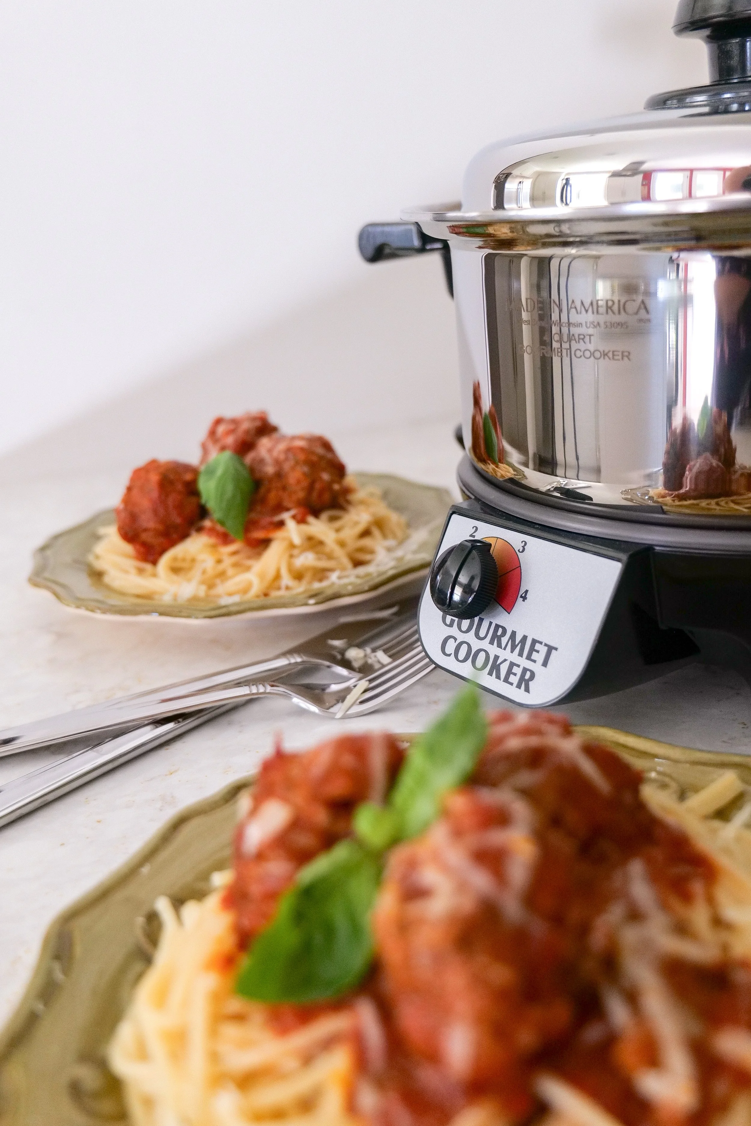 Easy weeknight slow cooker dinner featuring Italian meatballs in tomato sauce
