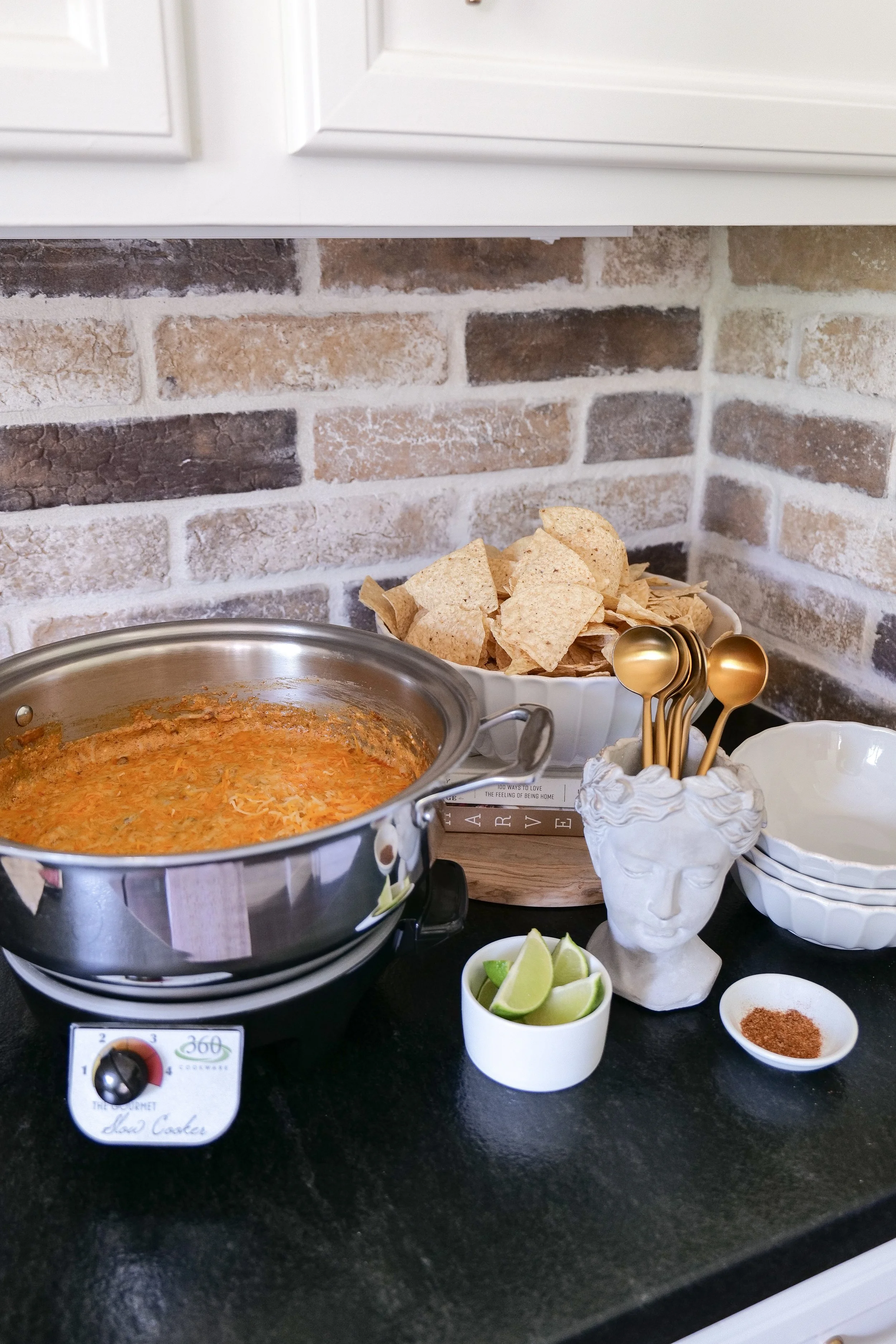 Creamy chicken enchilada dip with shredded chicken, black beans and melted Mexican-style cheese.