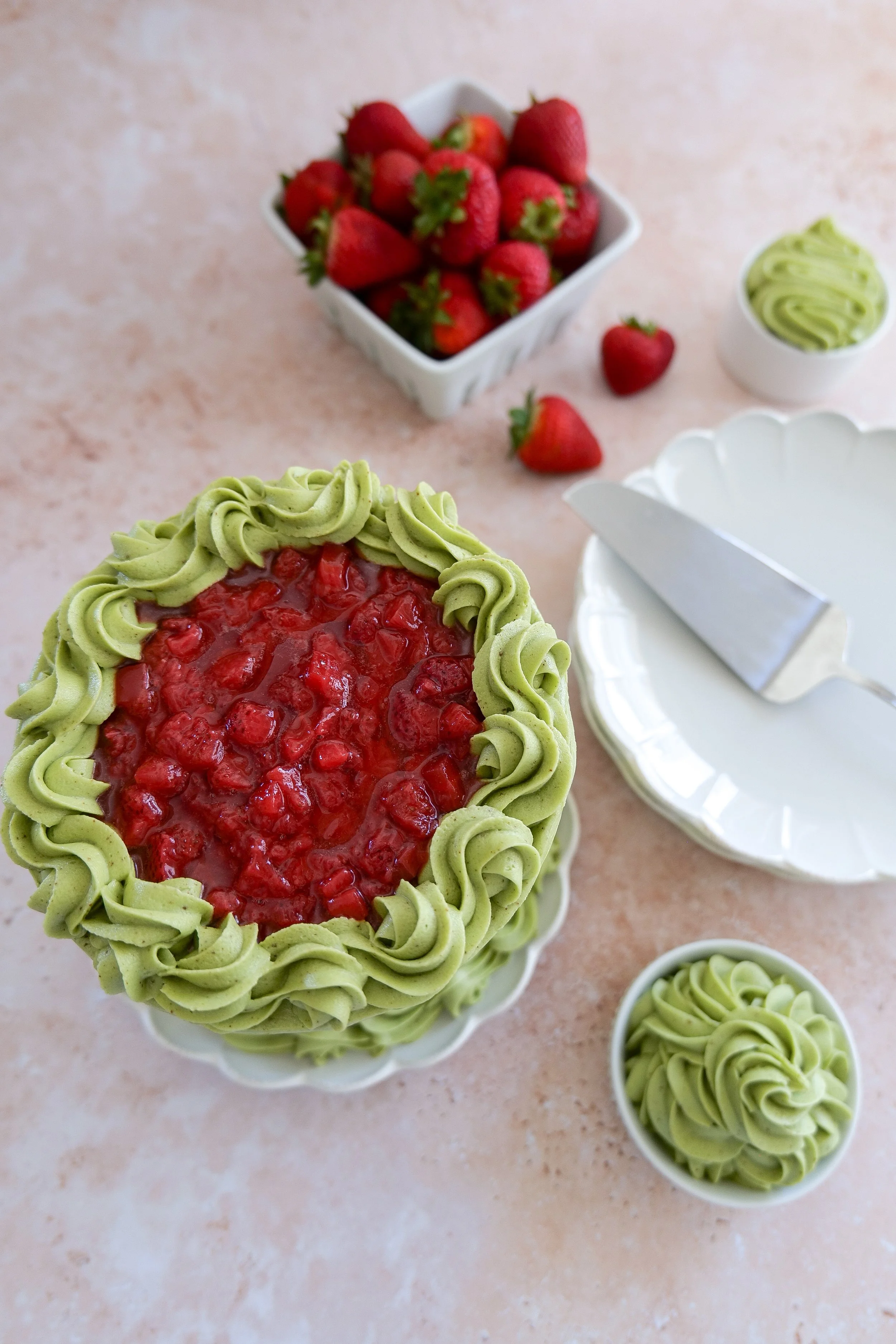 Matcha strawberry cake topped with fresh strawberry filling